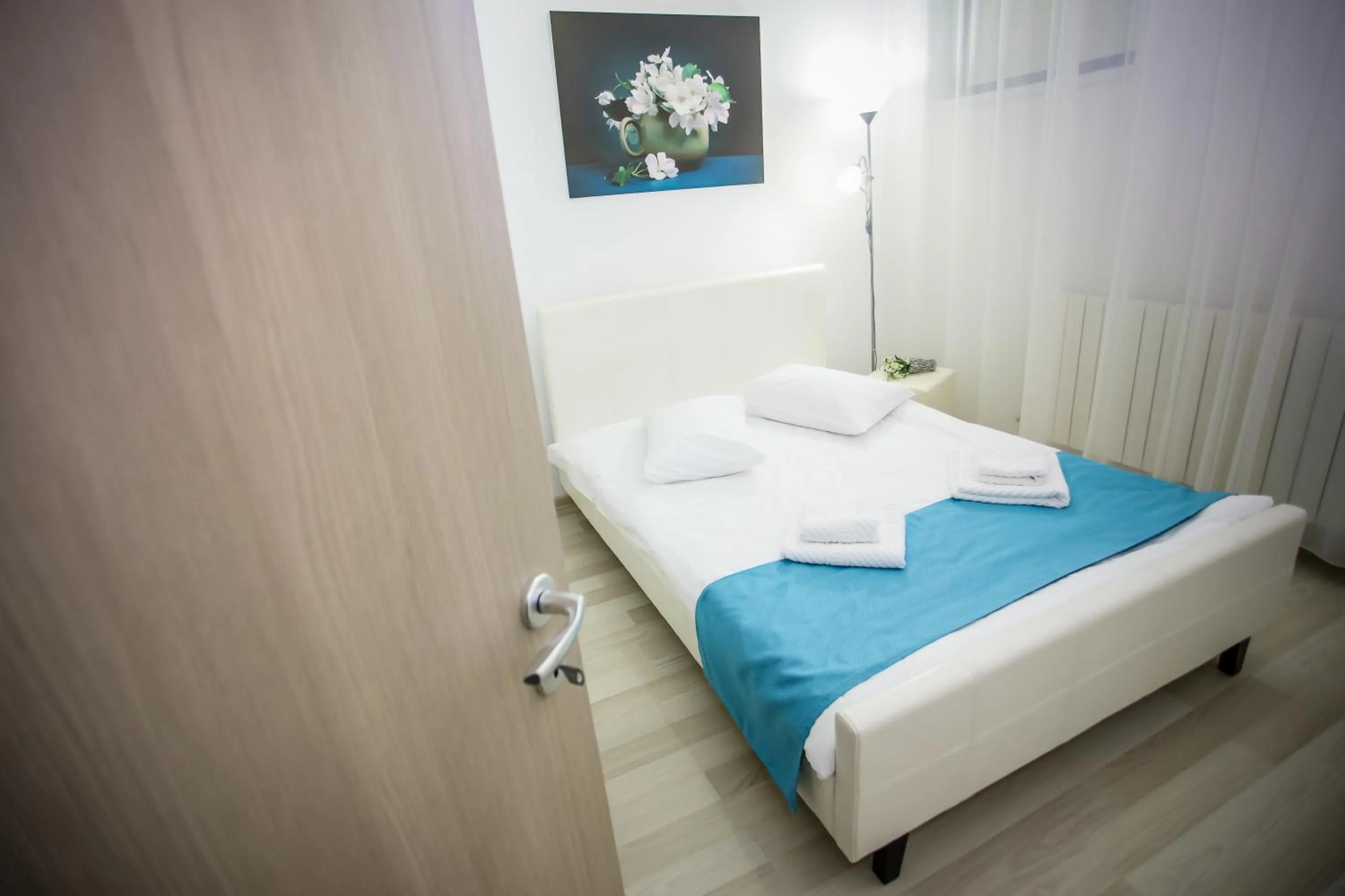 Bed in Iassium Residence Iasi