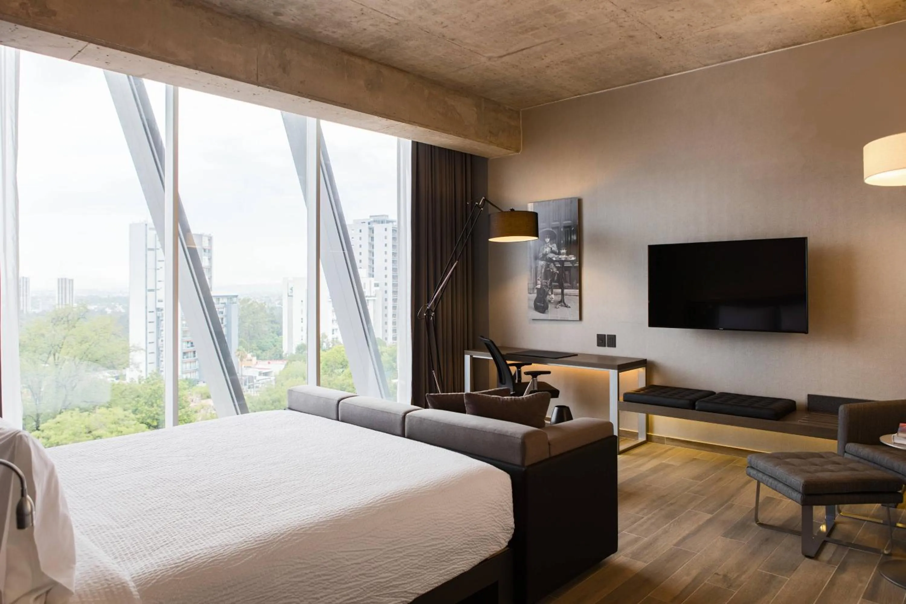 Photo of the whole room, Bed in AC Hotel by Marriott Guadalajara Mexico