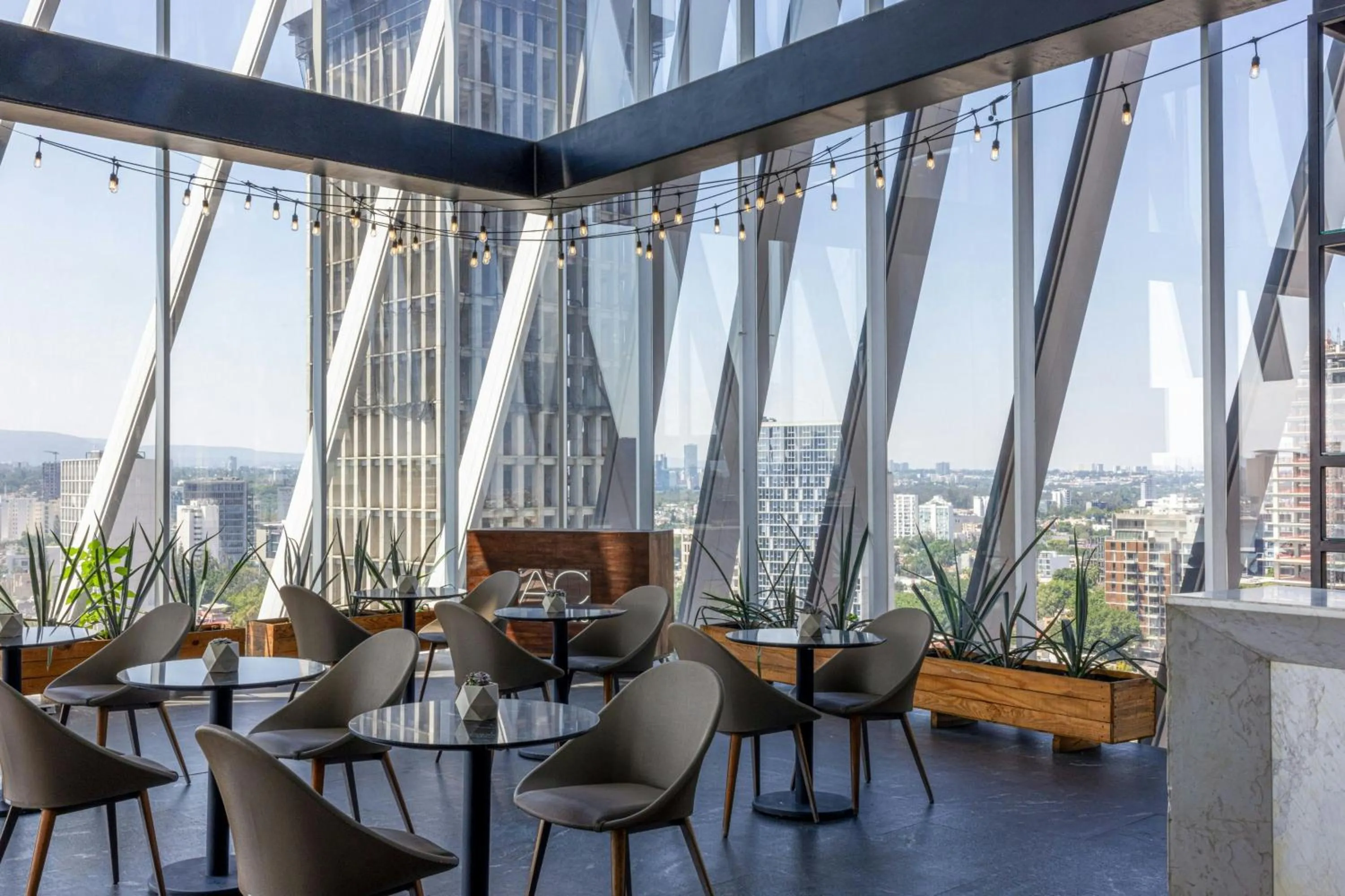 Lounge or bar in AC Hotel by Marriott Guadalajara Mexico