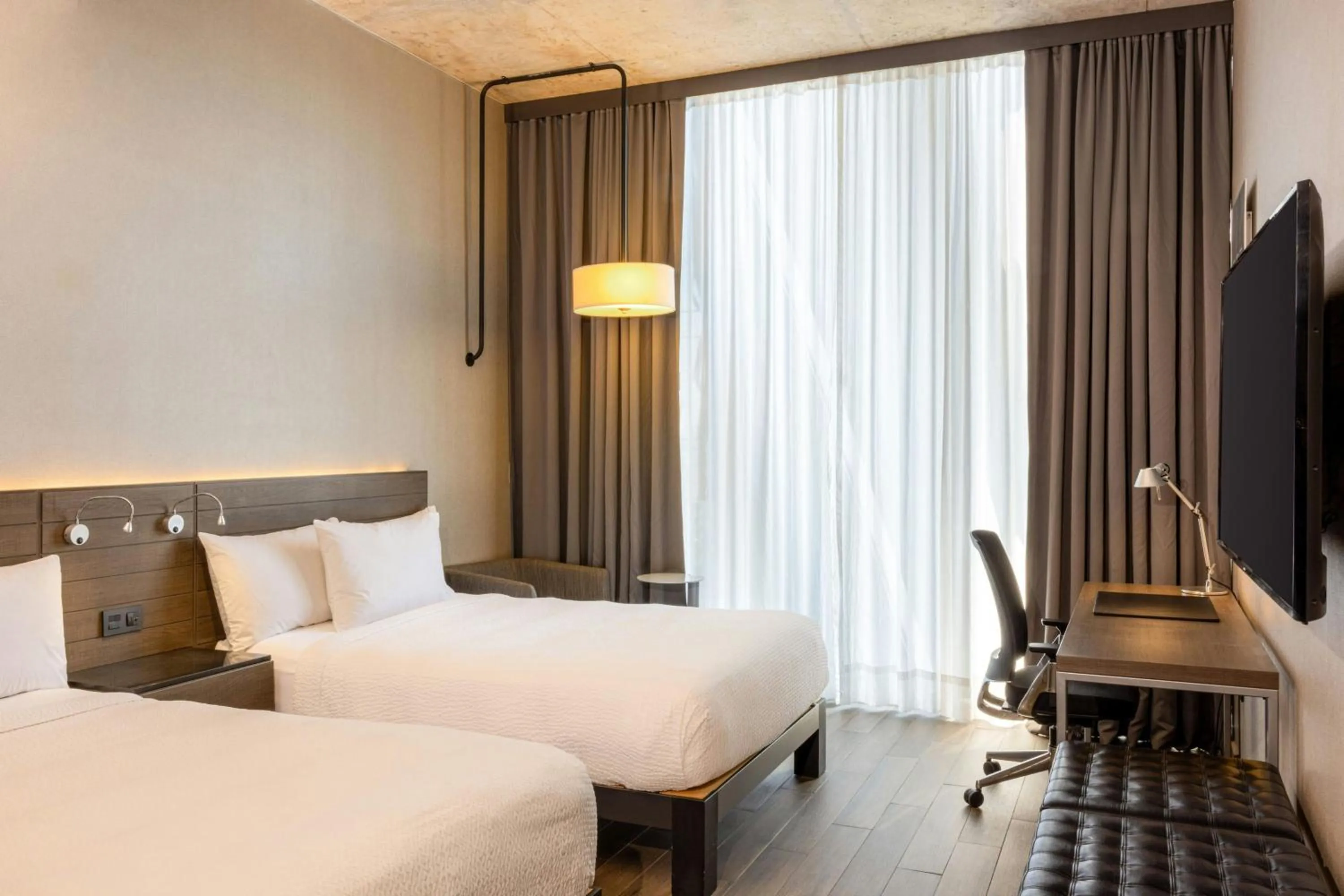 Photo of the whole room, Bed in AC Hotel by Marriott Guadalajara Mexico