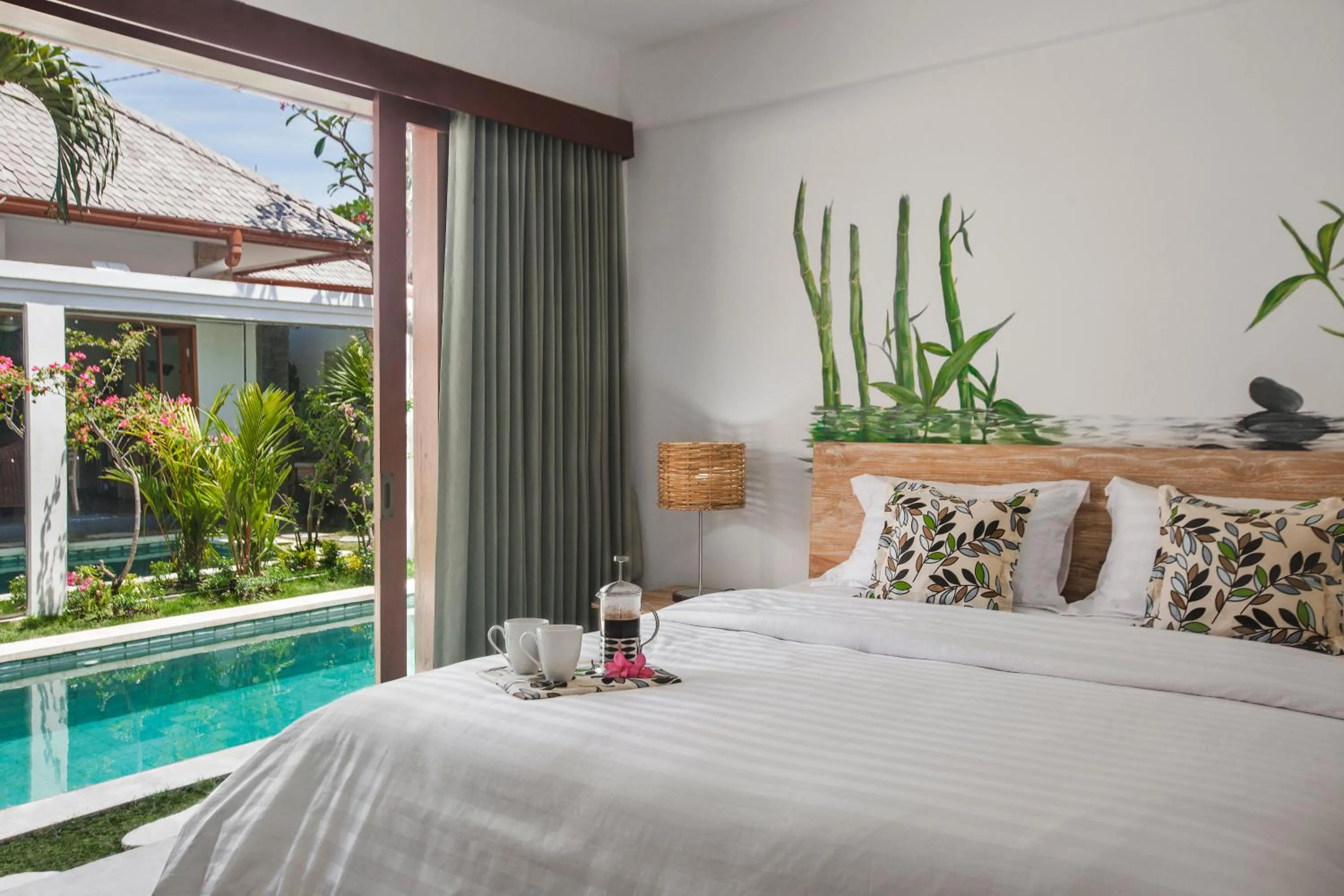 Bed in Two Lizards Beach Villas