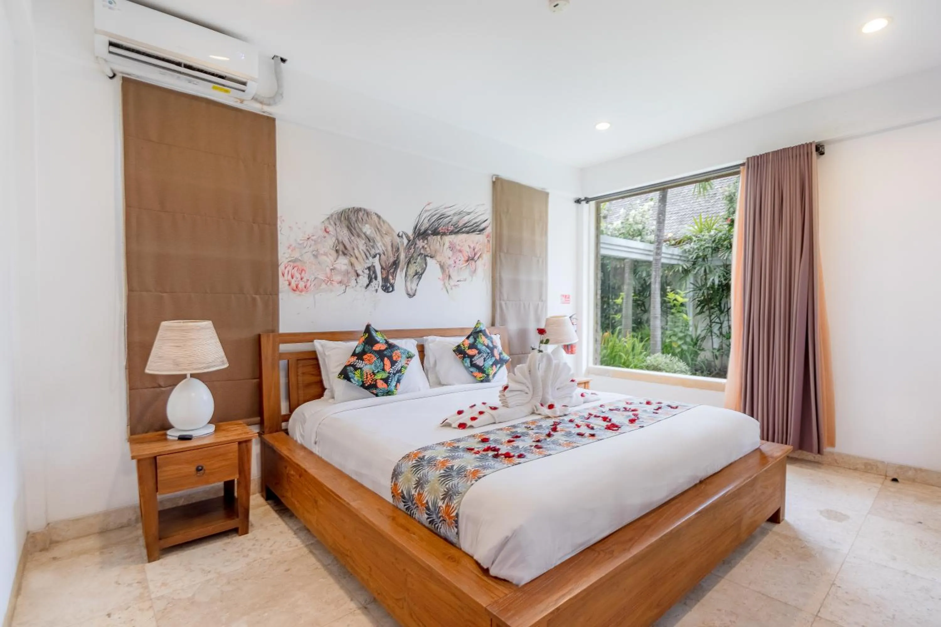 Bed in Two Lizards Beach Villas