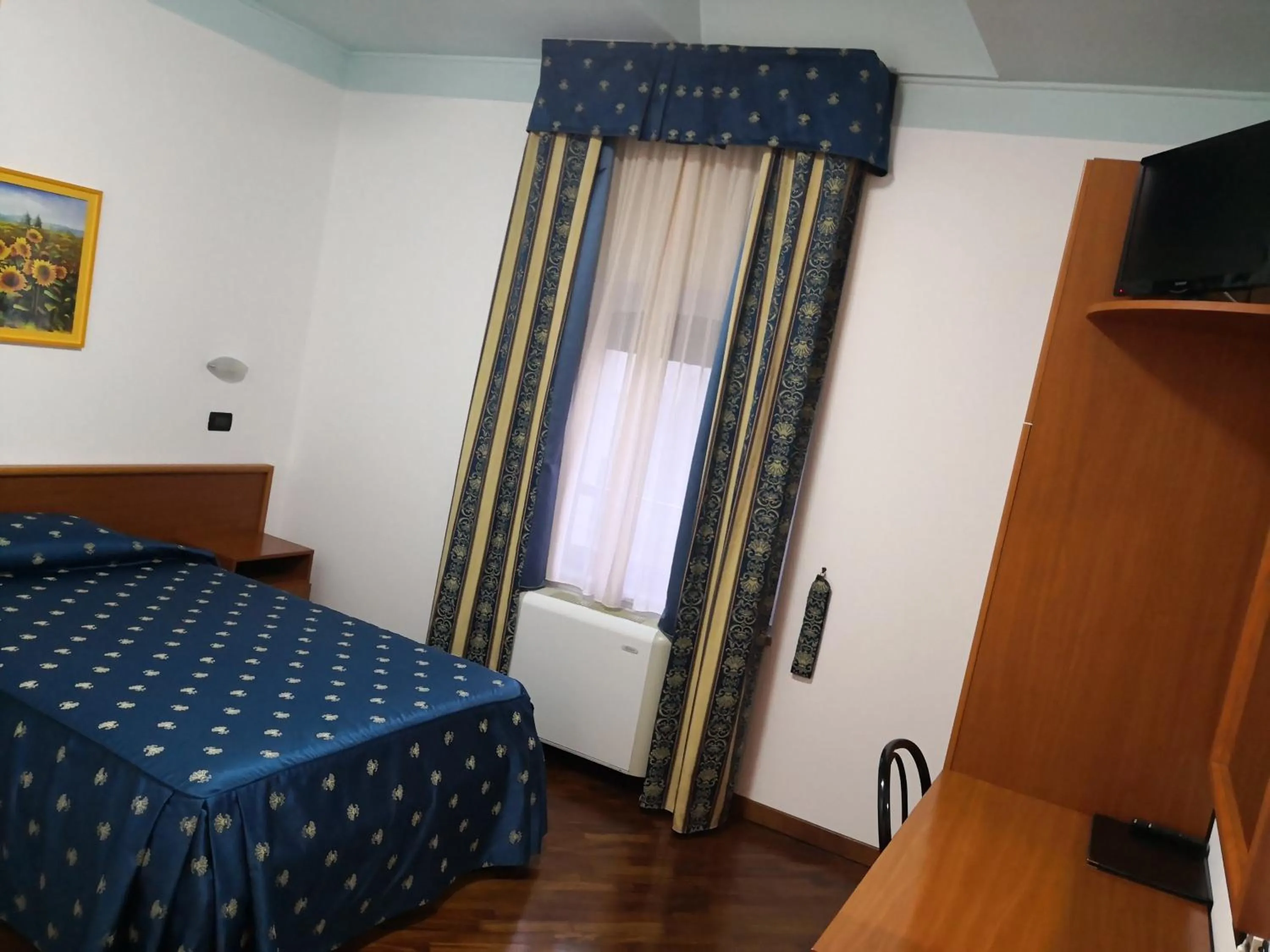 Bed in Hotel La Cantina