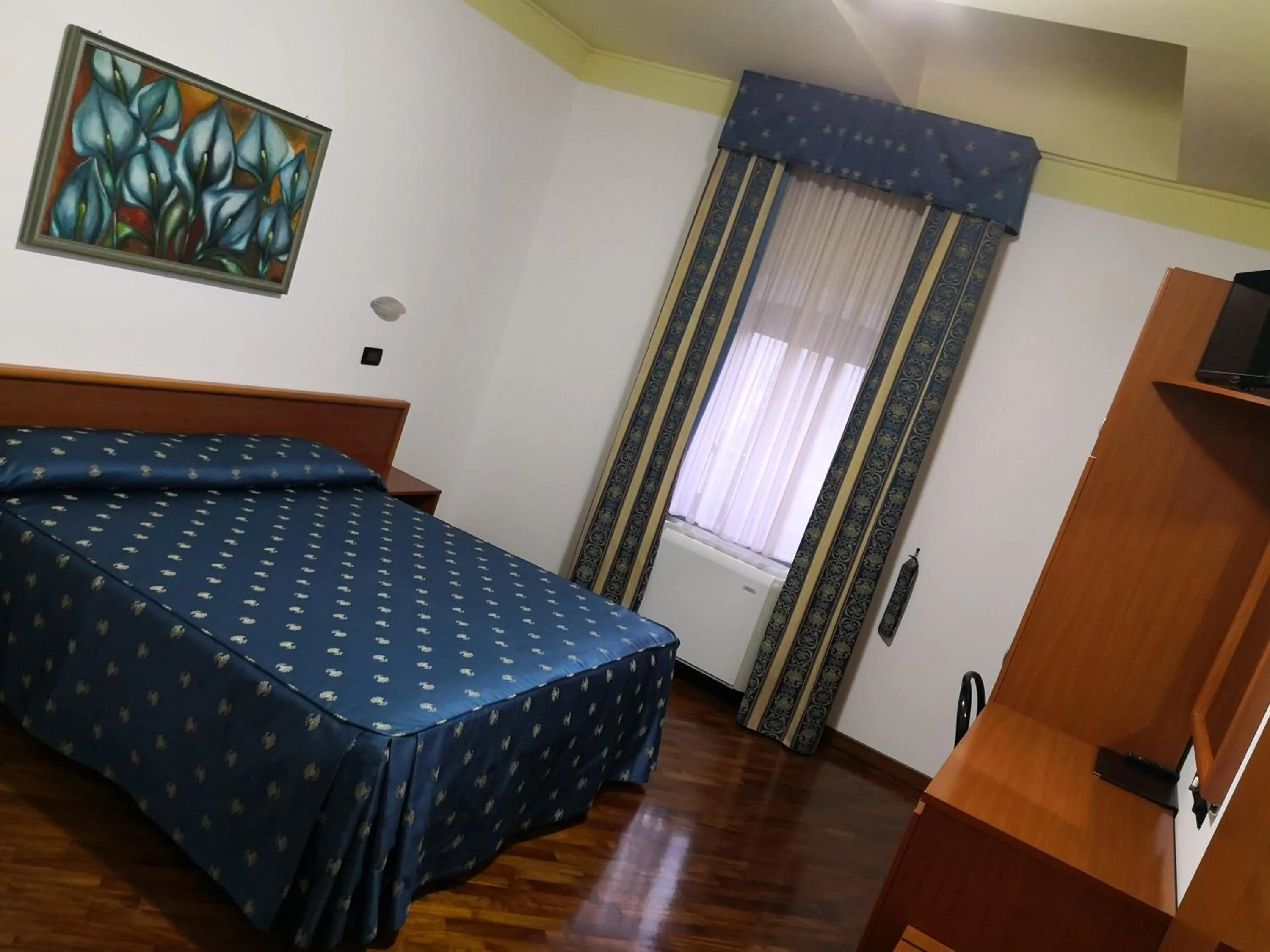 Bed in Hotel La Cantina