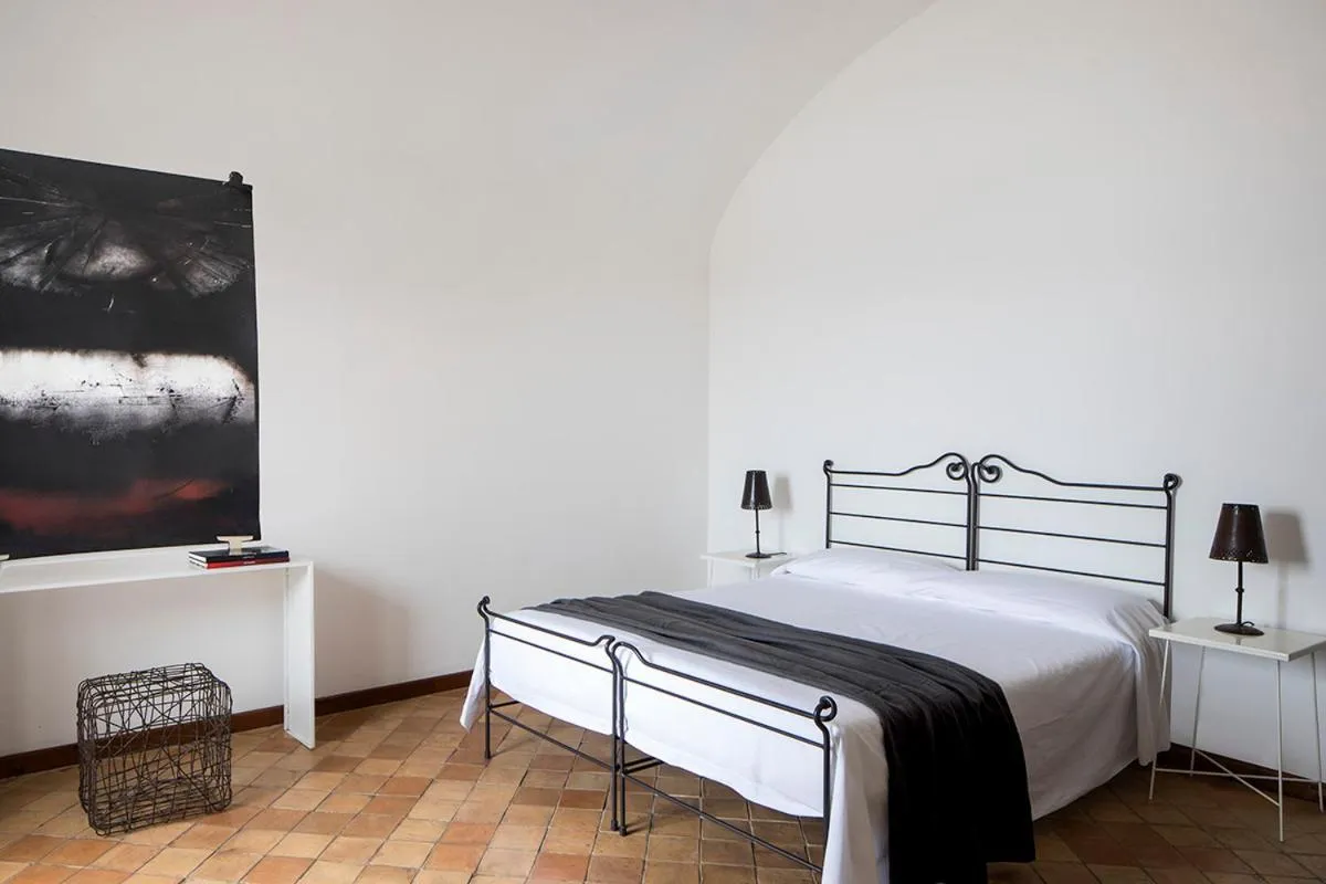Bed in Albergo Il Monastero