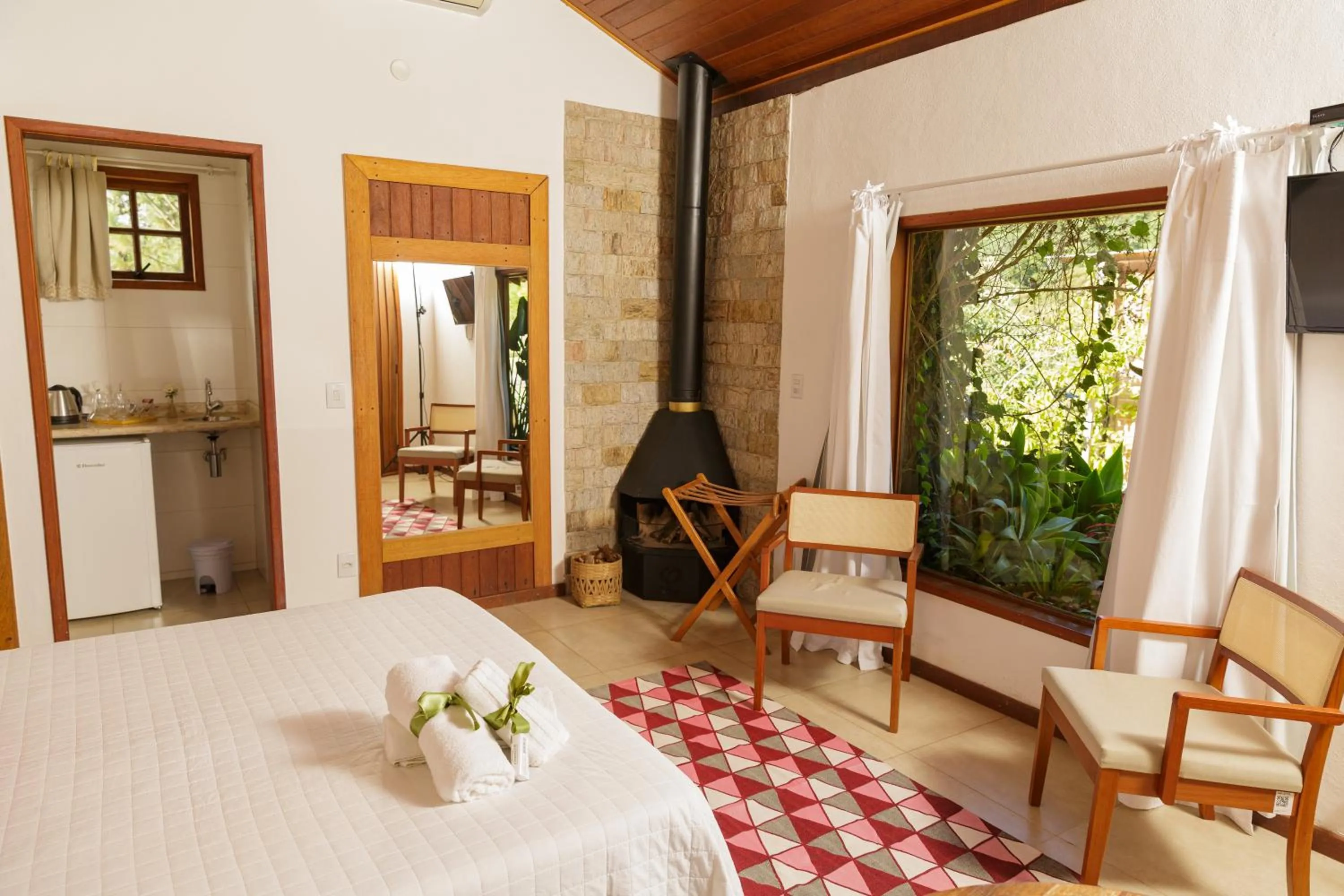 Bed in Pousada das Bromélias