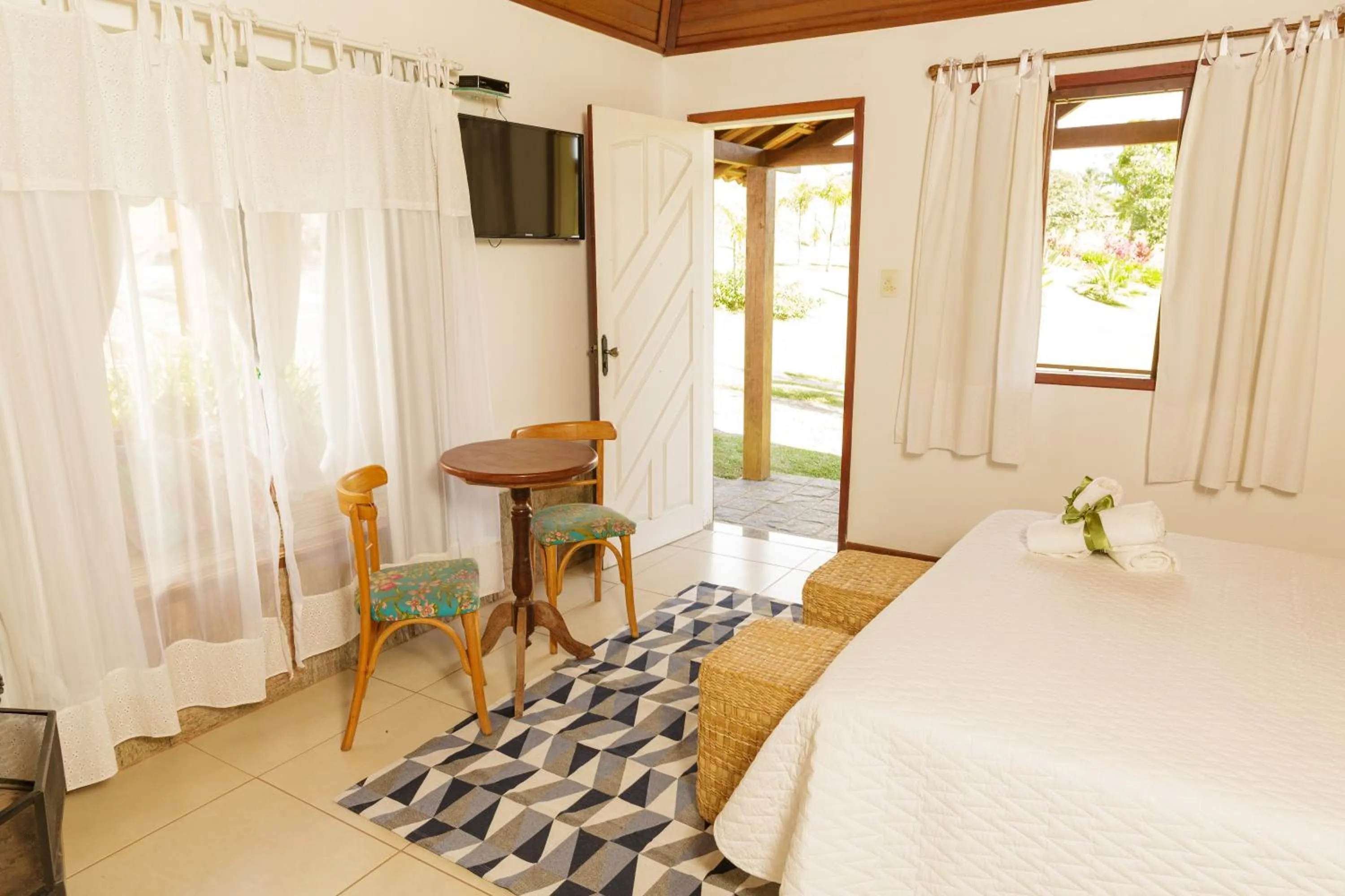 Bed in Pousada das Bromélias