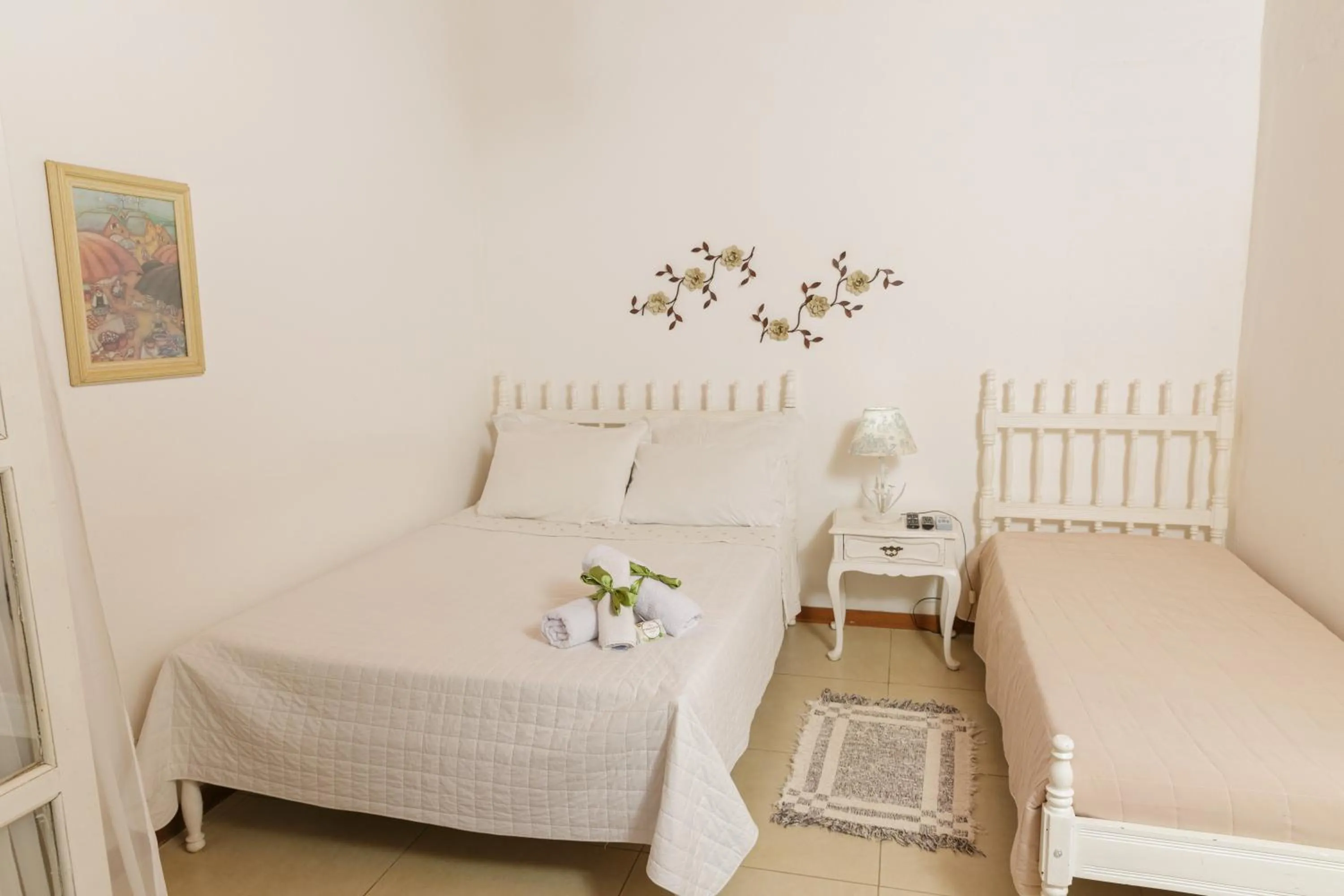 Bed in Pousada das Bromélias