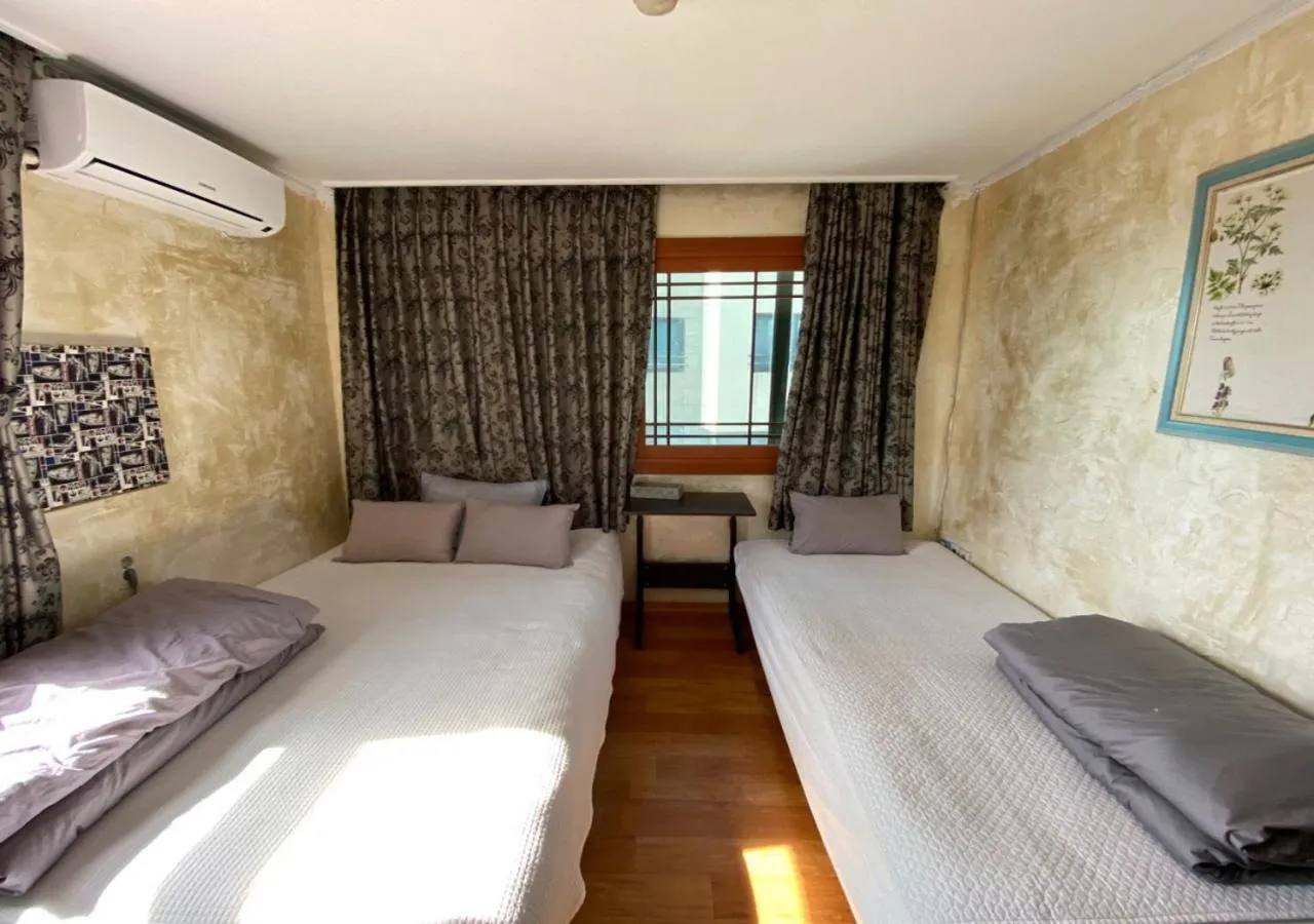 Property building, Bed in Gudeok Guesthouse