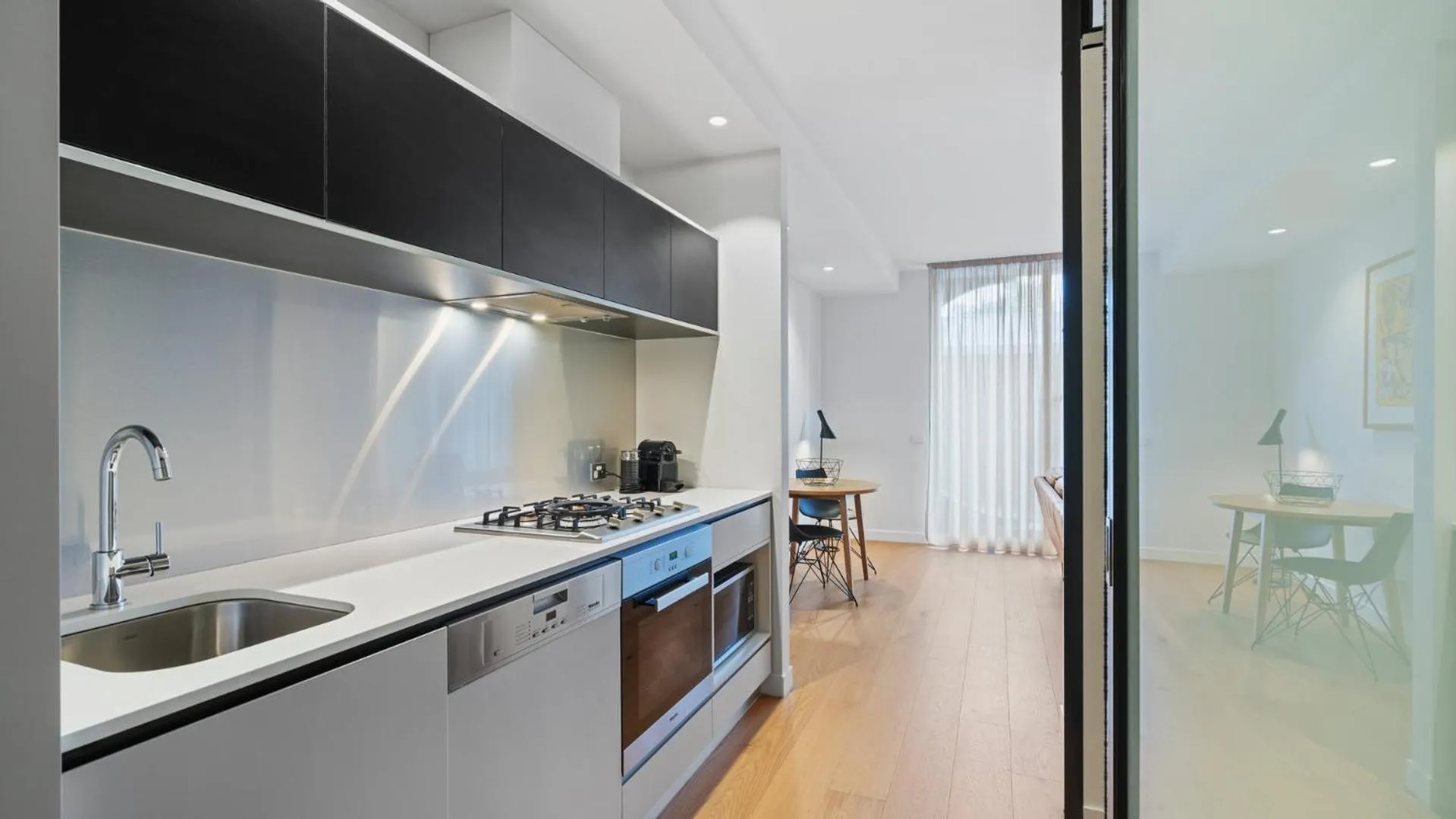 Kitchen or kitchenette in District Apartments Fitzroy
