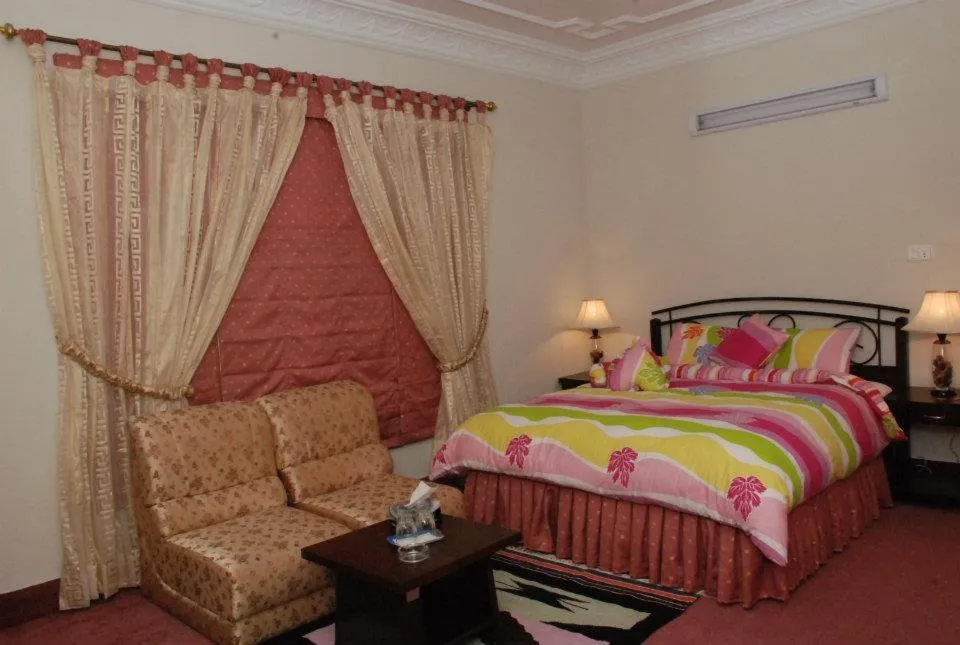 Photo of the whole room, Bed in Savoy Inn Guest House Islamabad