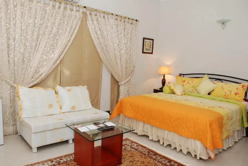 Photo of the whole room, Bed in Savoy Inn Guest House Islamabad