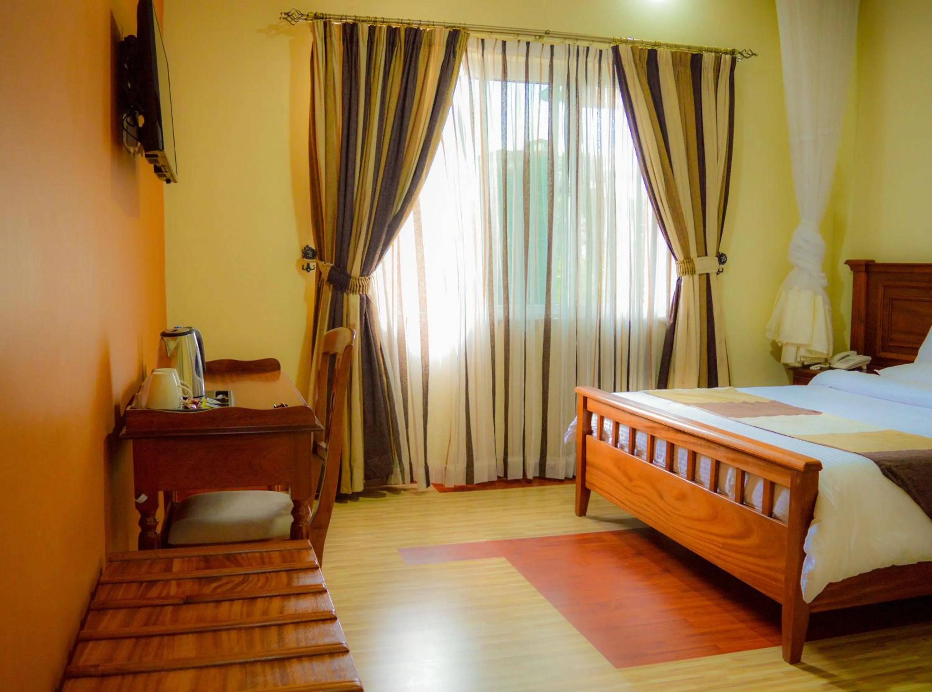 Decorative detail, Bed in Red Ruby Hotel