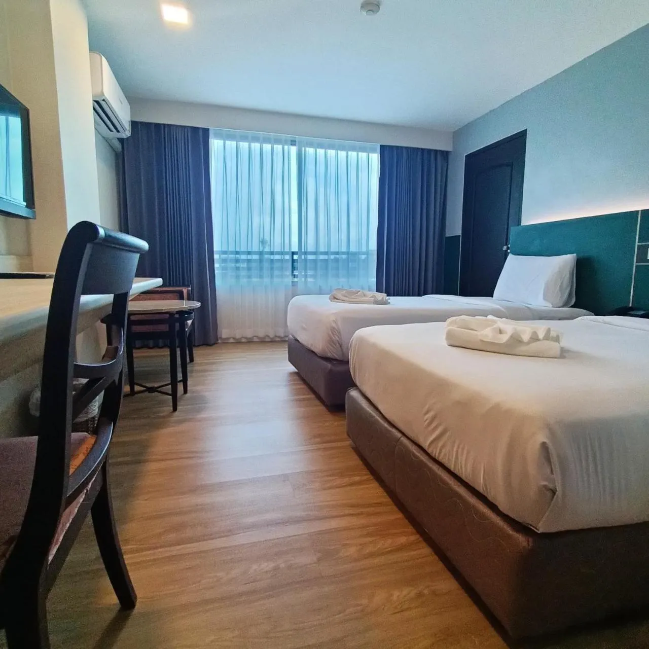 Bed in Mayflower Grande Hotel Phitsanulok