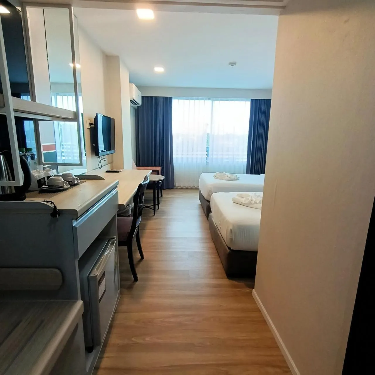 Photo of the whole room, Bed in Mayflower Grande Hotel Phitsanulok