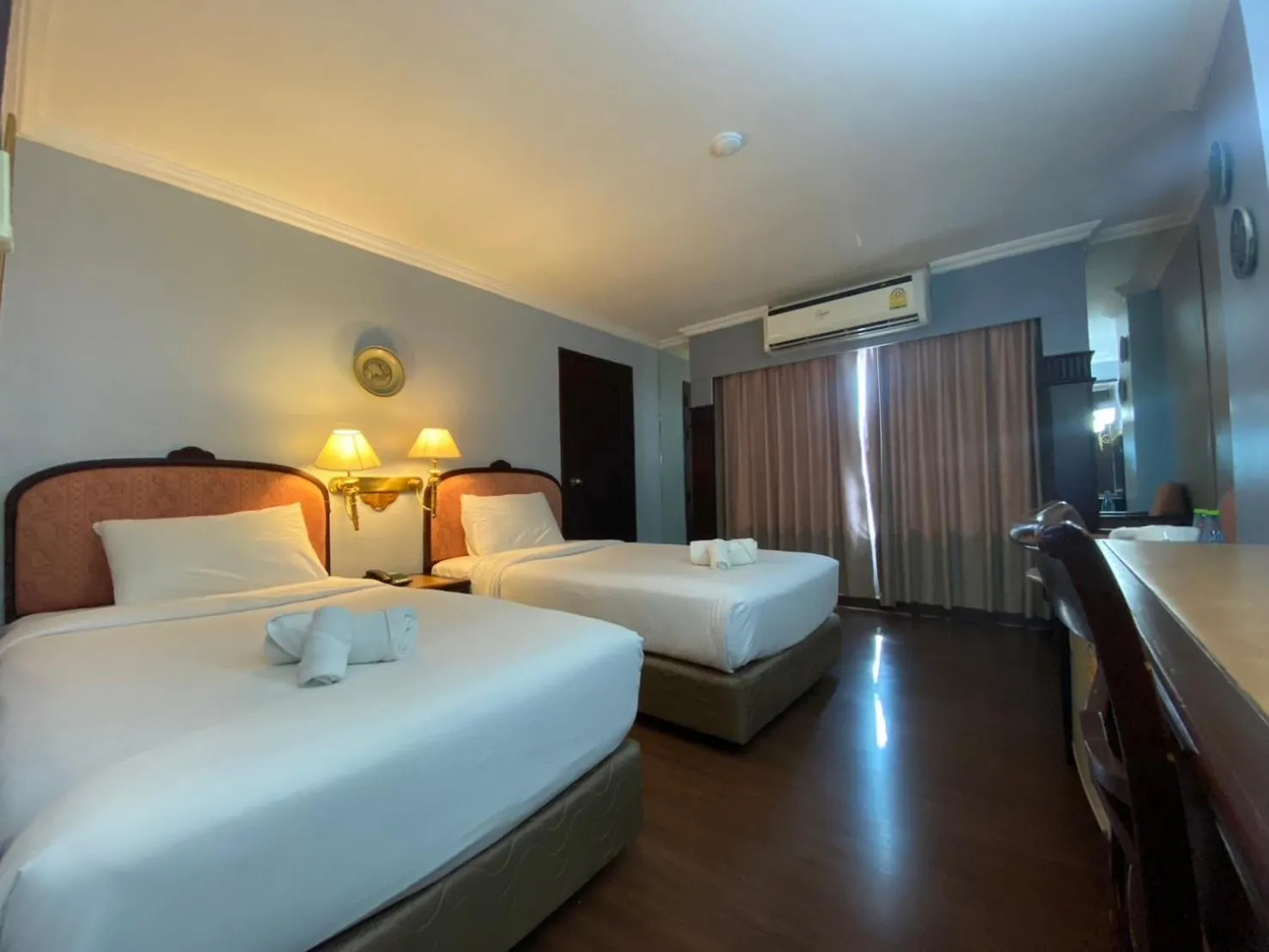 Bed in Mayflower Grande Hotel Phitsanulok