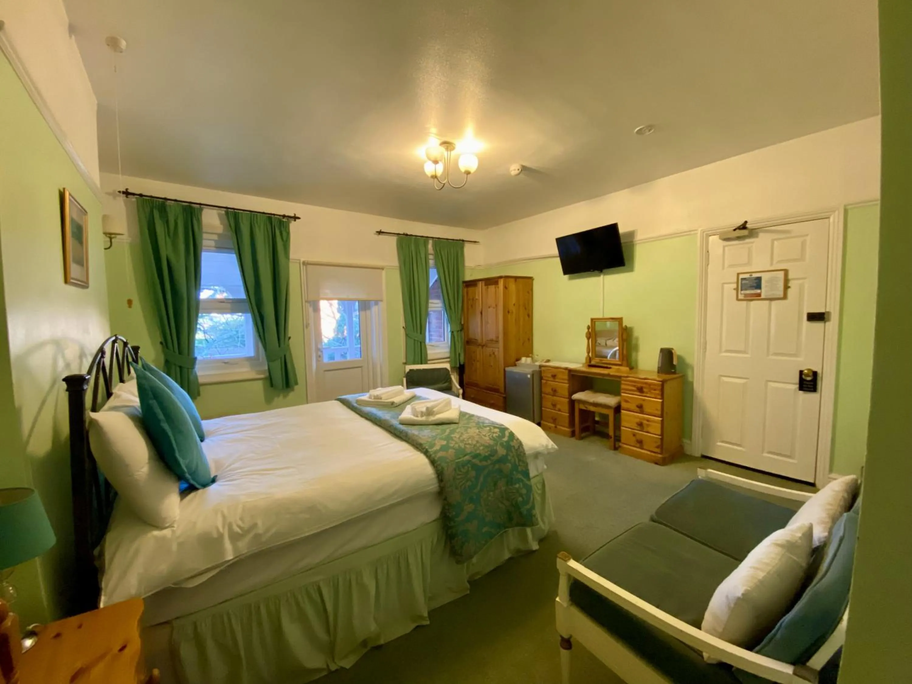 Bed in Pickwicks Guest House