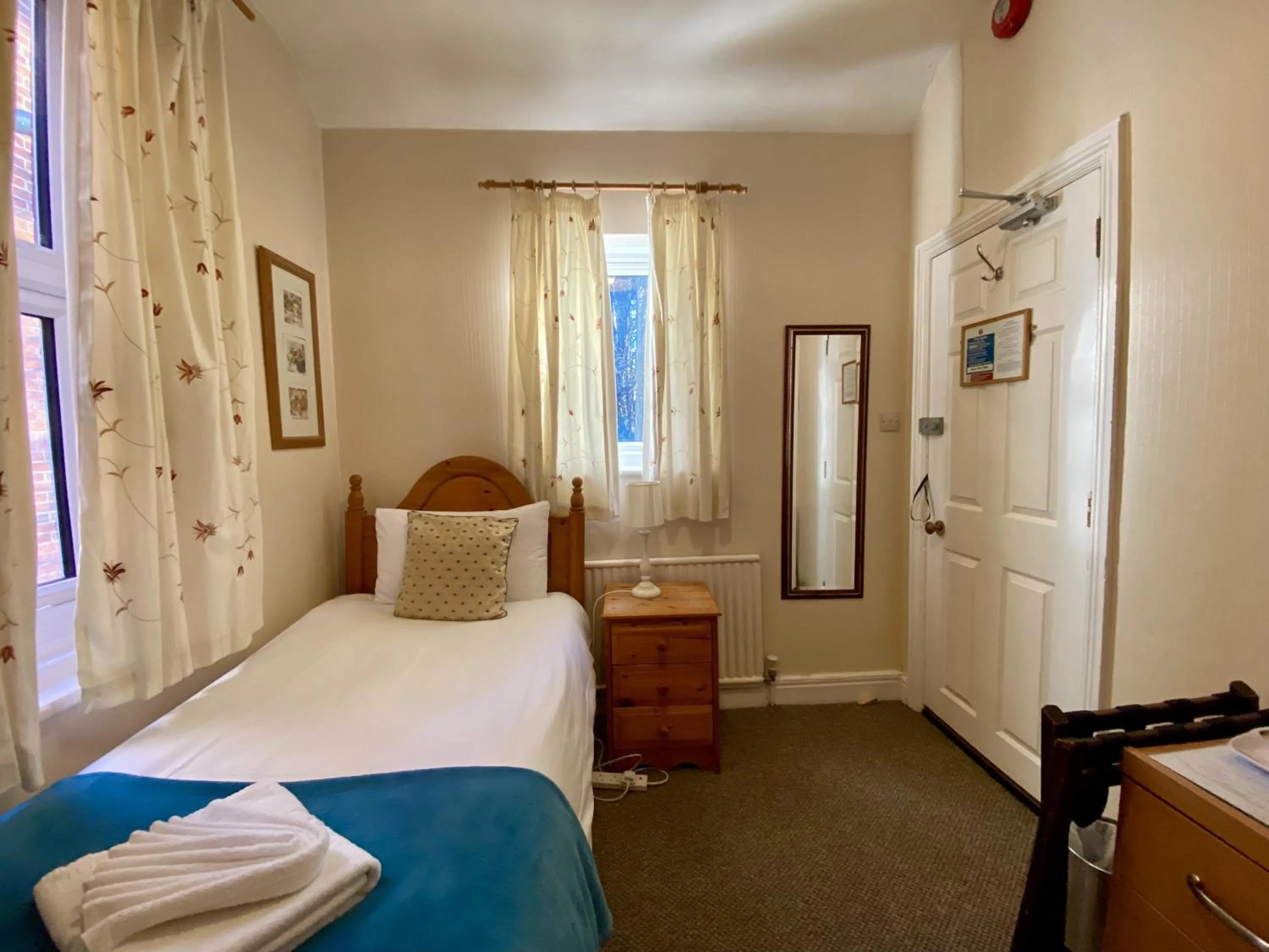 Bed in Pickwicks Guest House