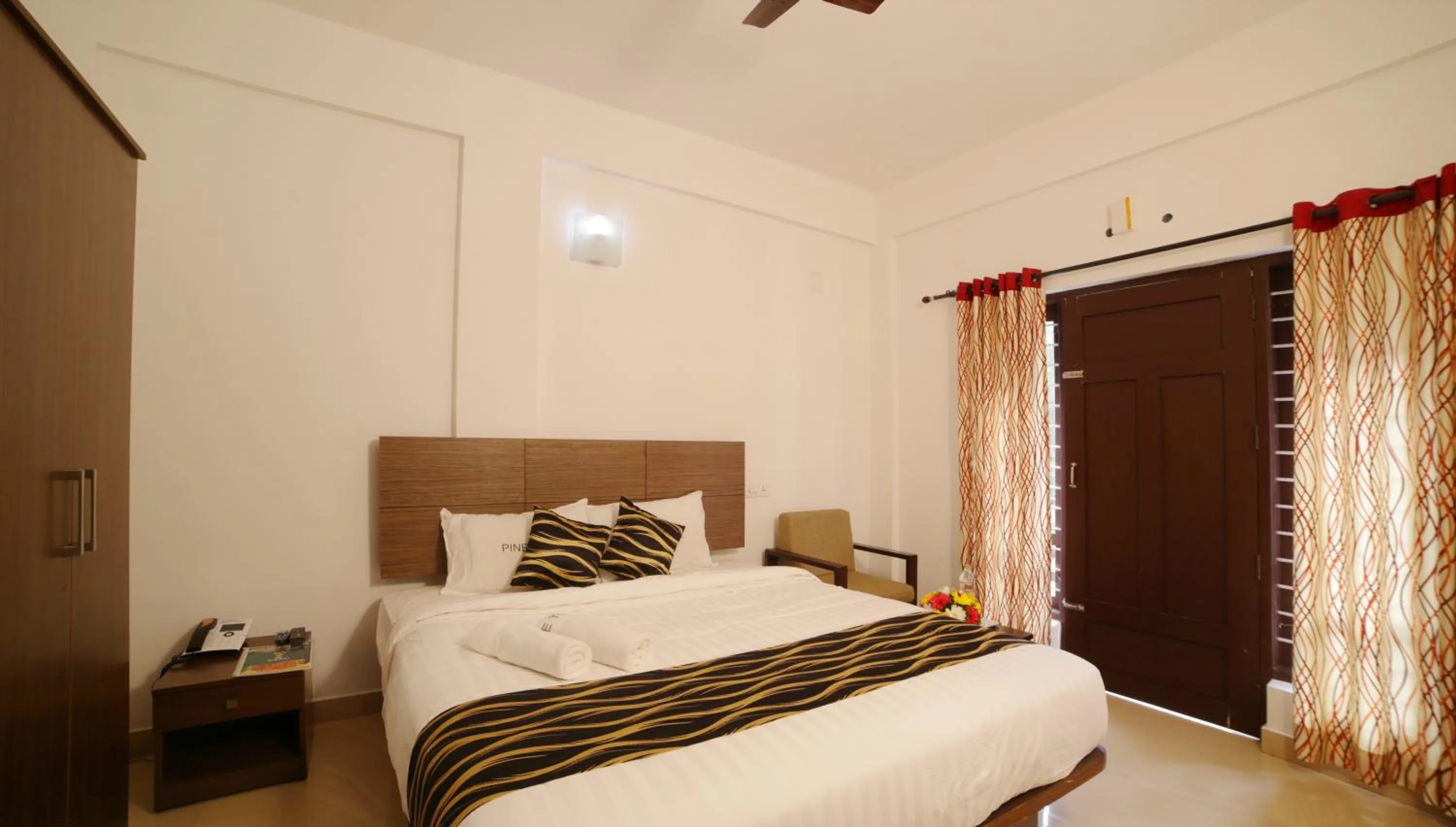 Bed in Pine Tree Munnar