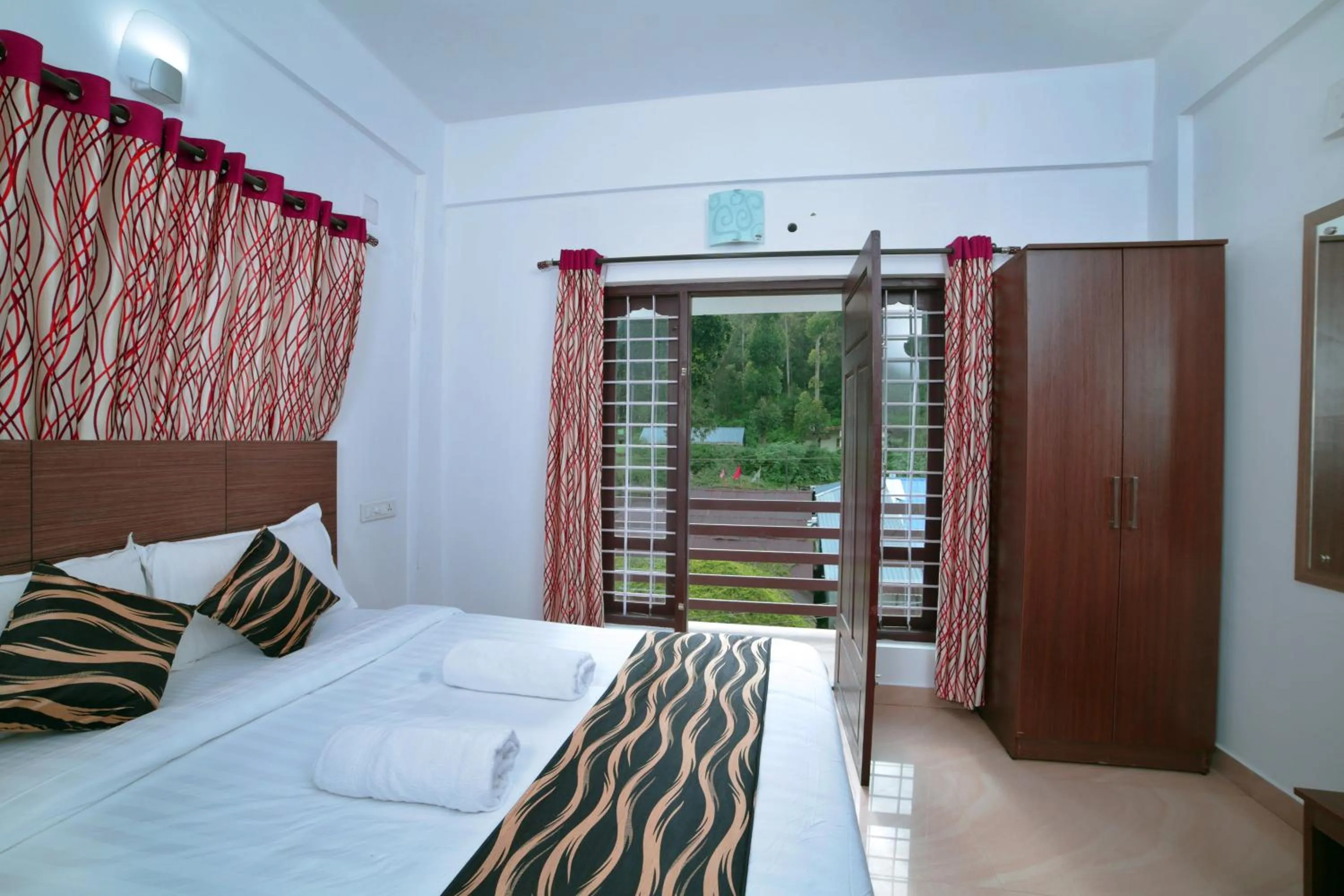 Bed in Pine Tree Munnar