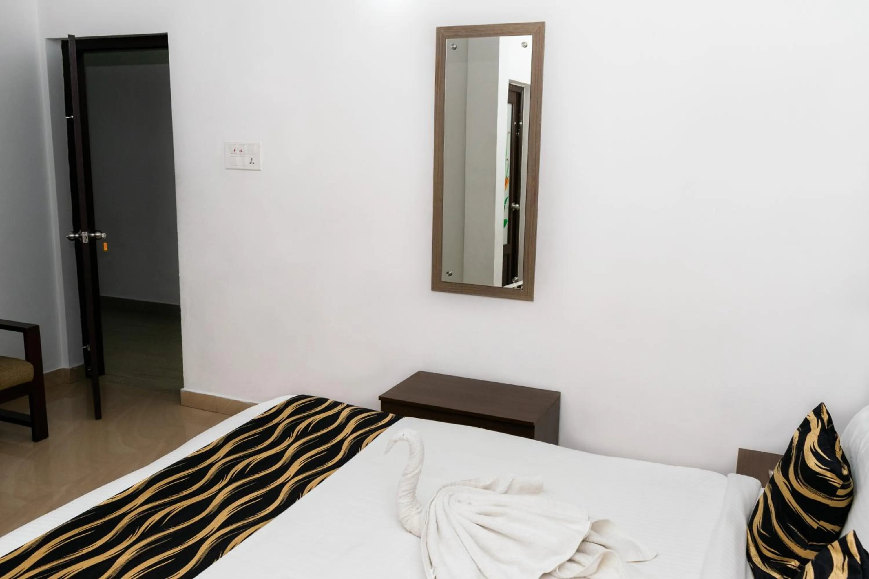 Bed in Pine Tree Munnar