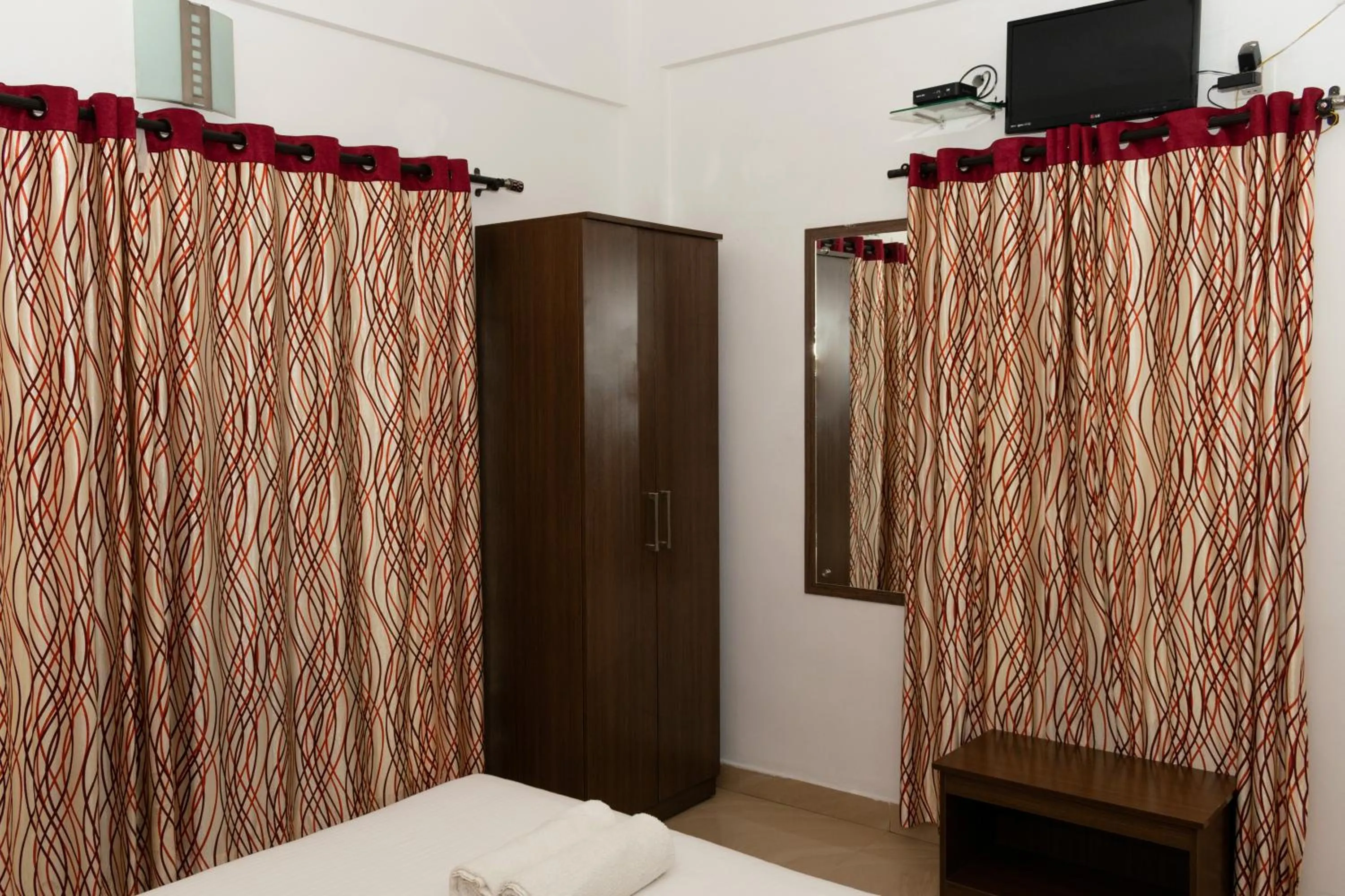 Bed in Pine Tree Munnar