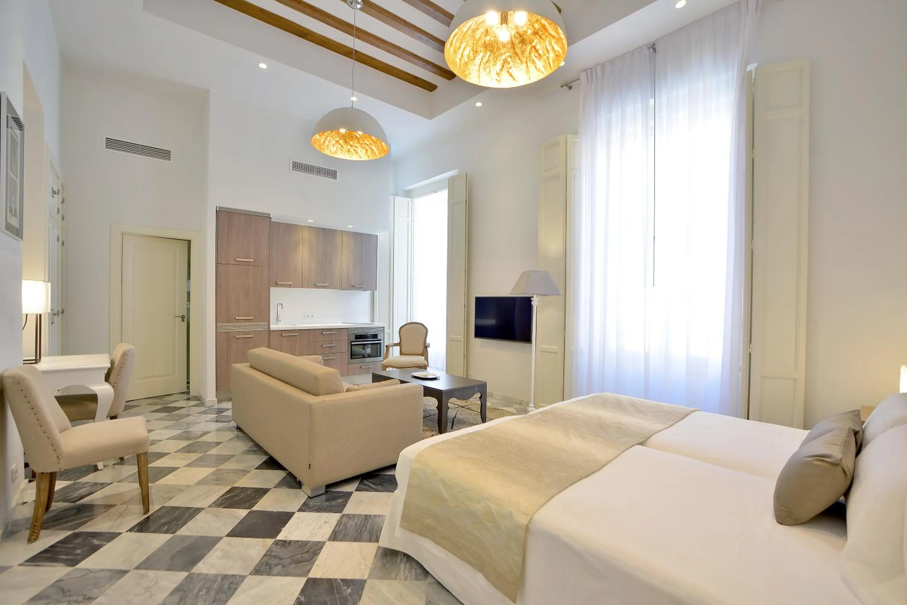 Photo of the whole room, Bed in El Armador Casa Palacio by Luxury Suites Cádiz
