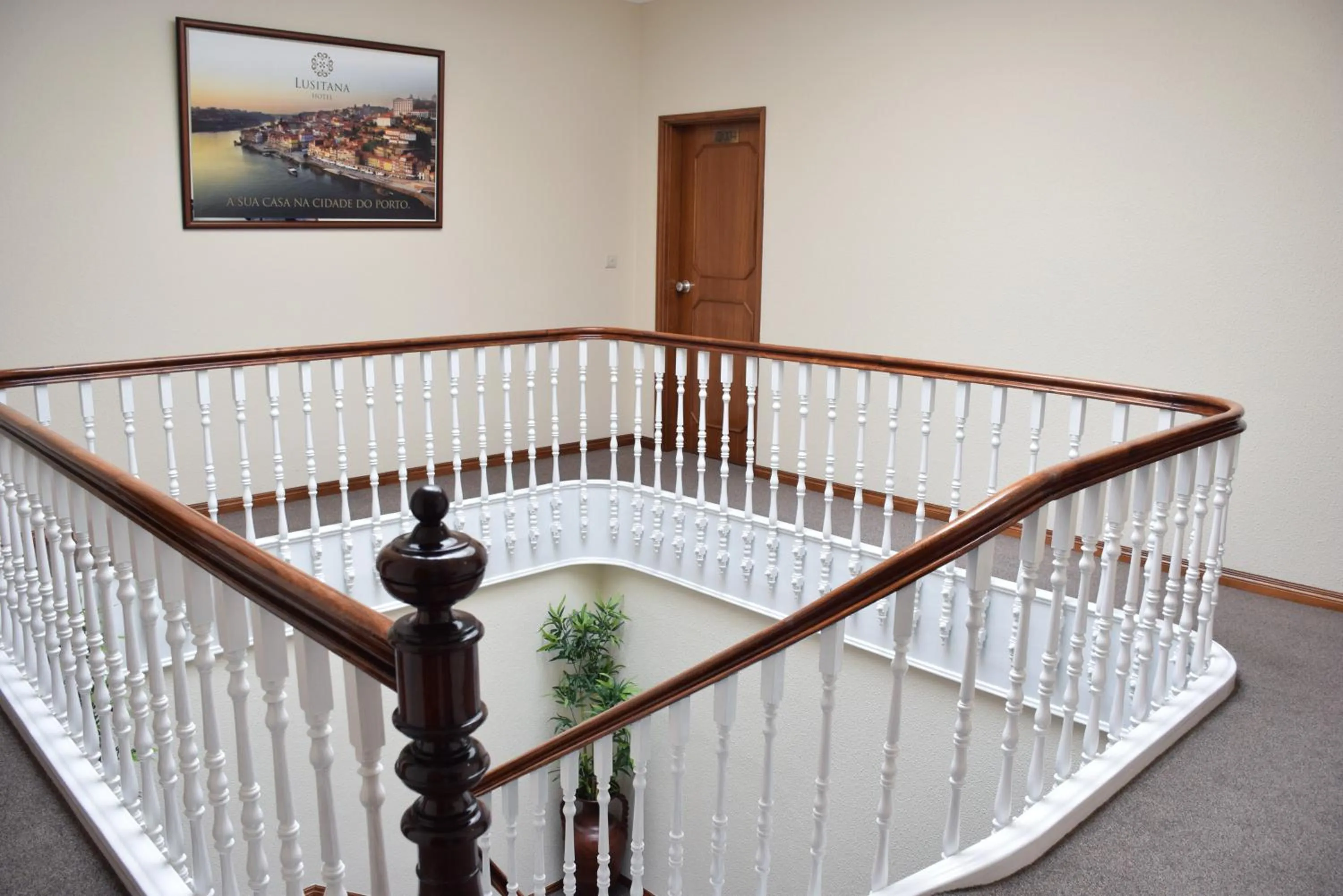 Property building, Bed in Lusitana Hotel