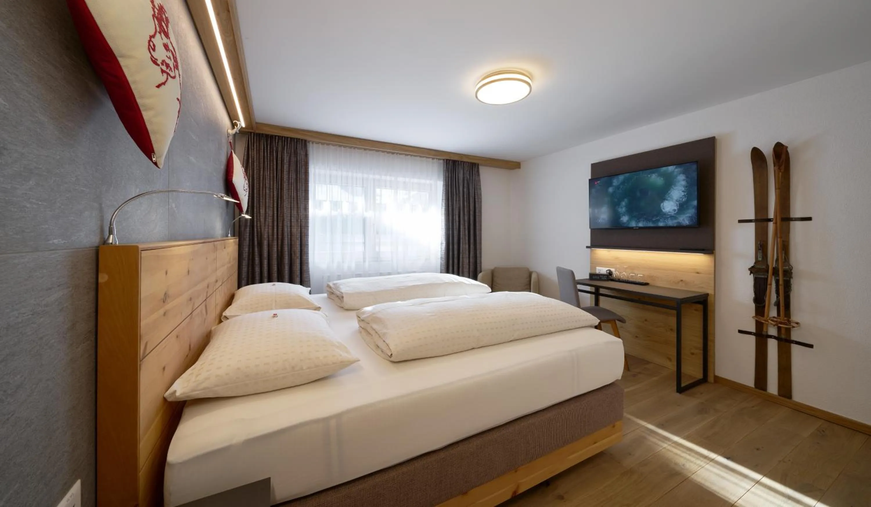 Bed in Aparthotel Grischuna