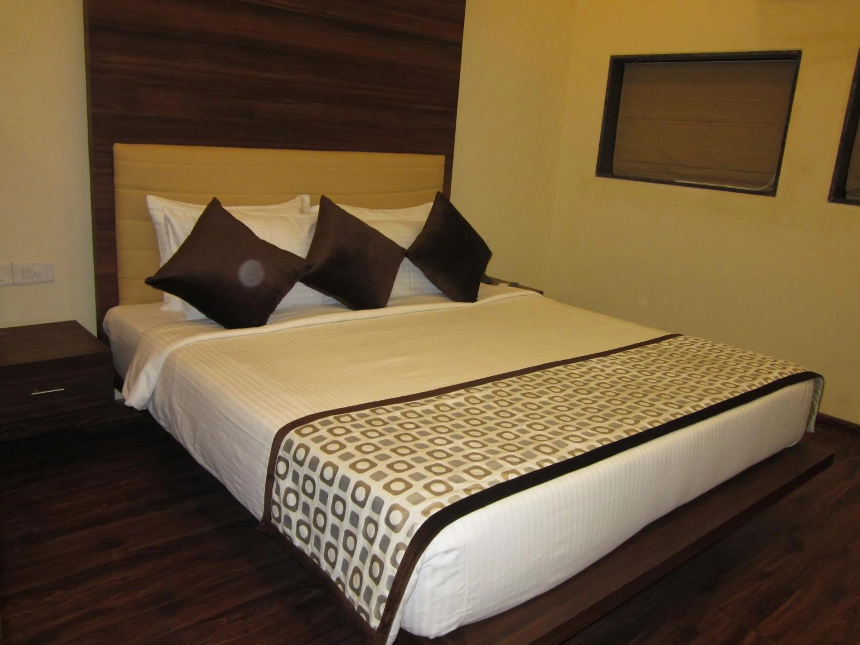 Bed in Vijaya Tej Clarks Inn