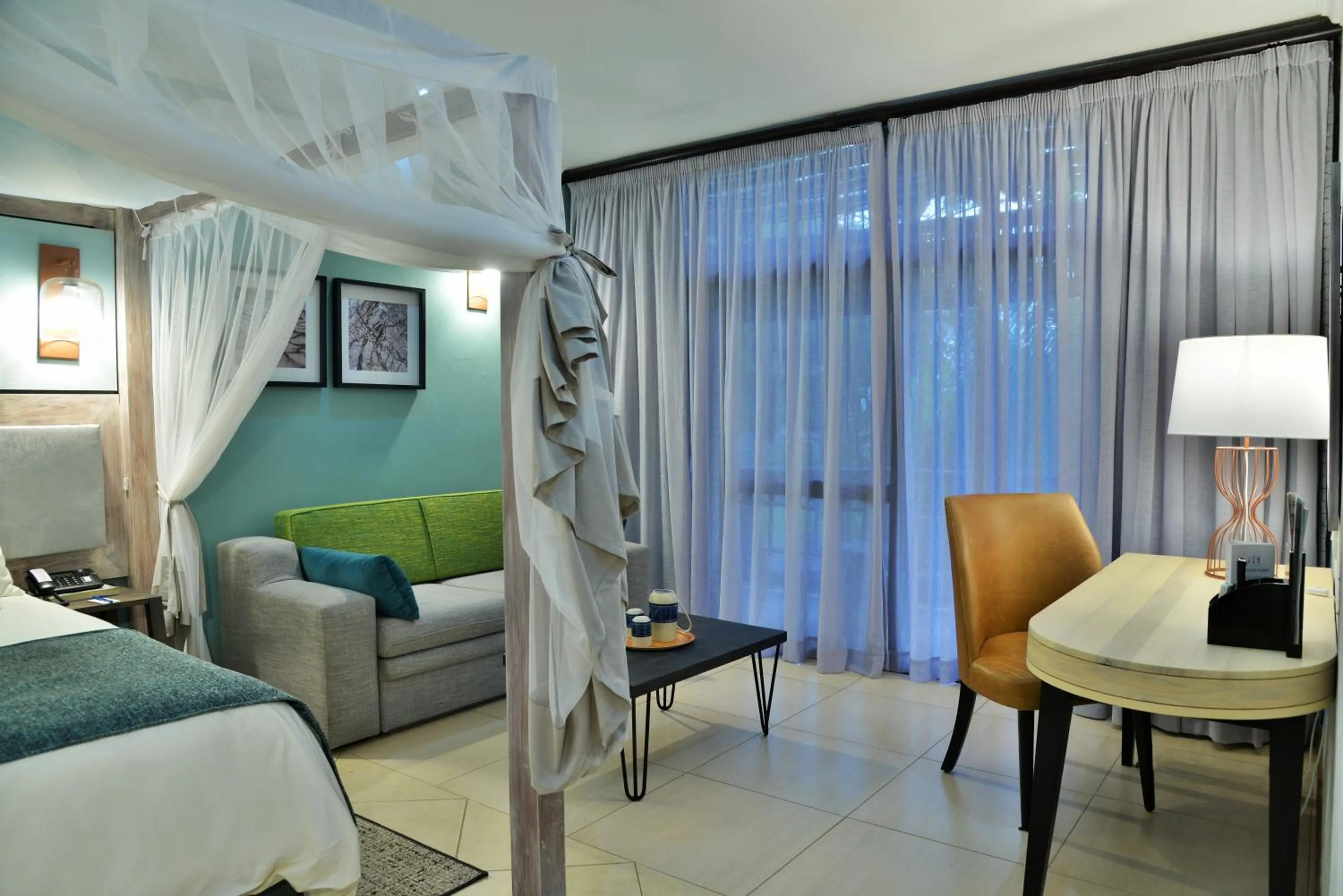 Seating area, Bed in Cresta Mowana Safari Resort & Spa