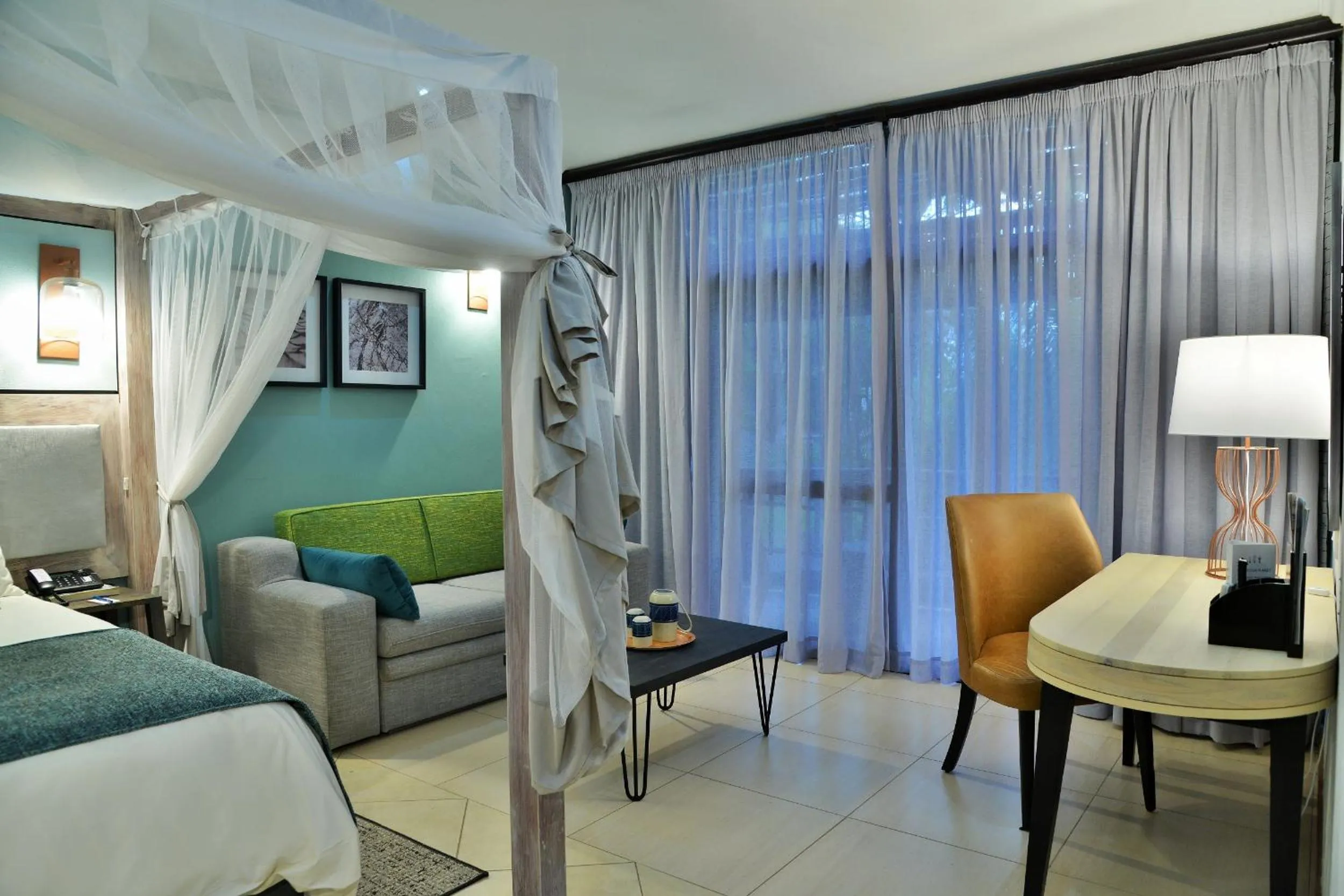 Seating area, Bed in Cresta Mowana Safari Resort & Spa