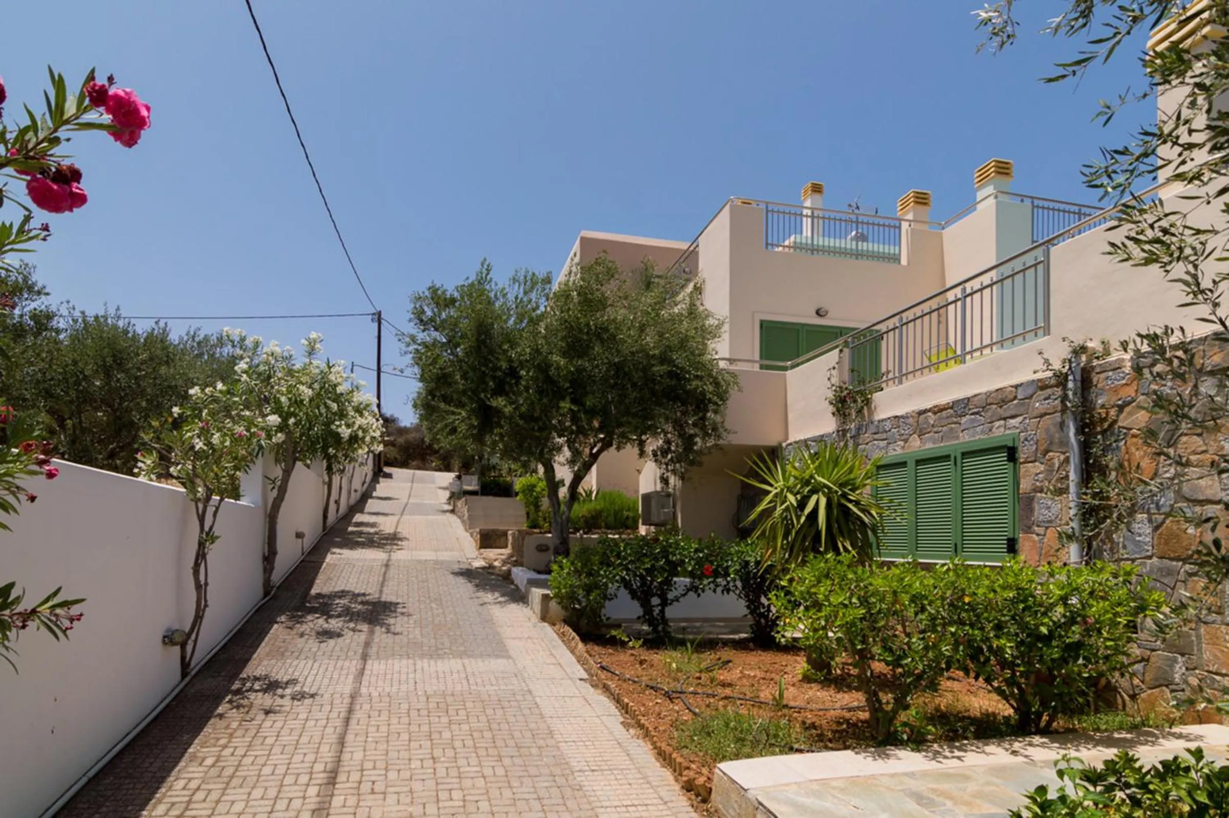 Property building in Athena Villas Olive Grove & Estate