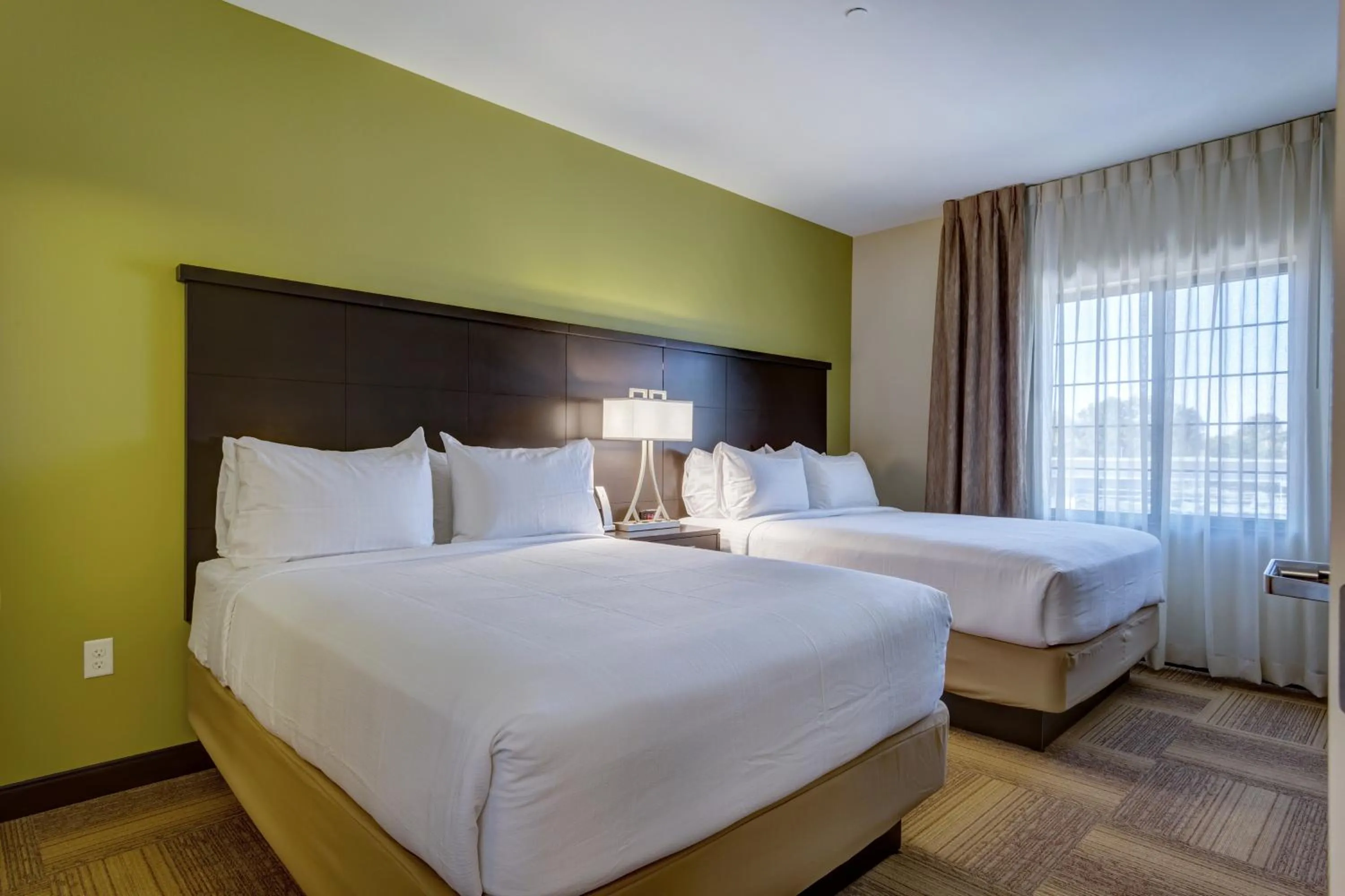 Bedroom, Bed in Staybridge Suites St Louis - Westport by IHG
