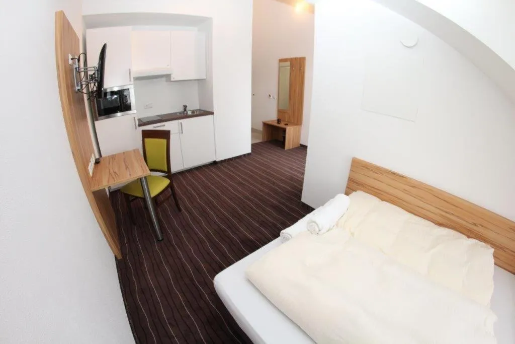 Photo of the whole room, Bed in Schäfer Boardinghouse