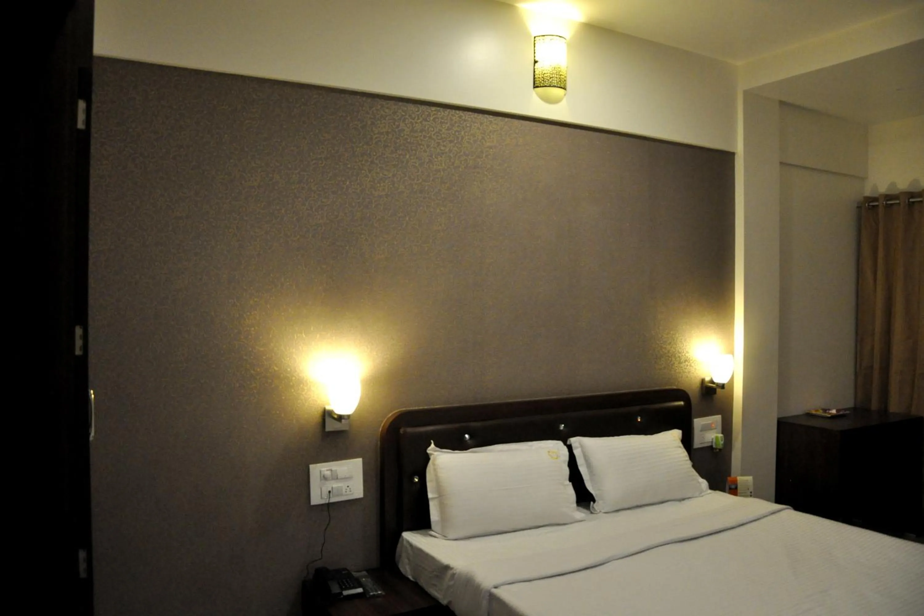 Photo of the whole room, Bed in Hotel Gulmohar Pride