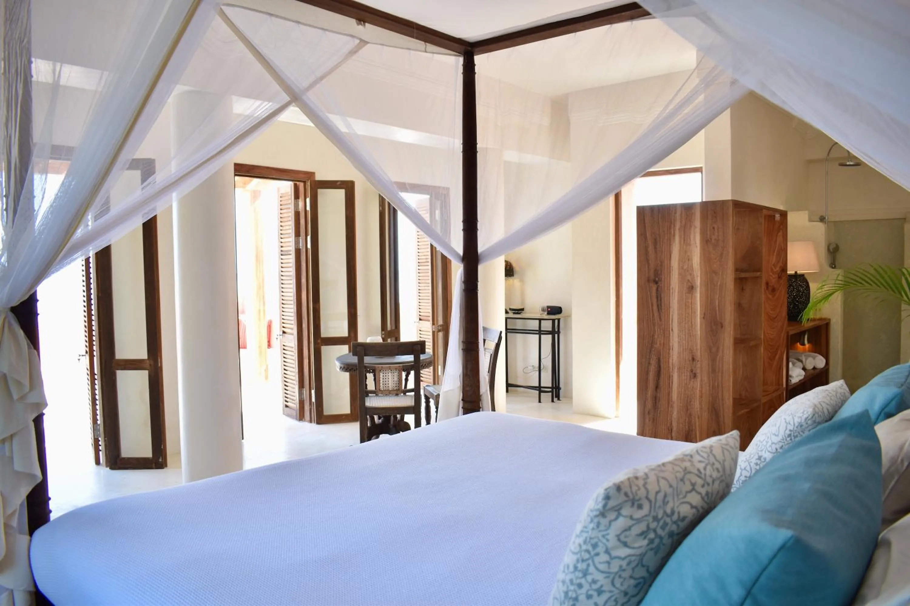 Bed in Qambani Luxury Resort