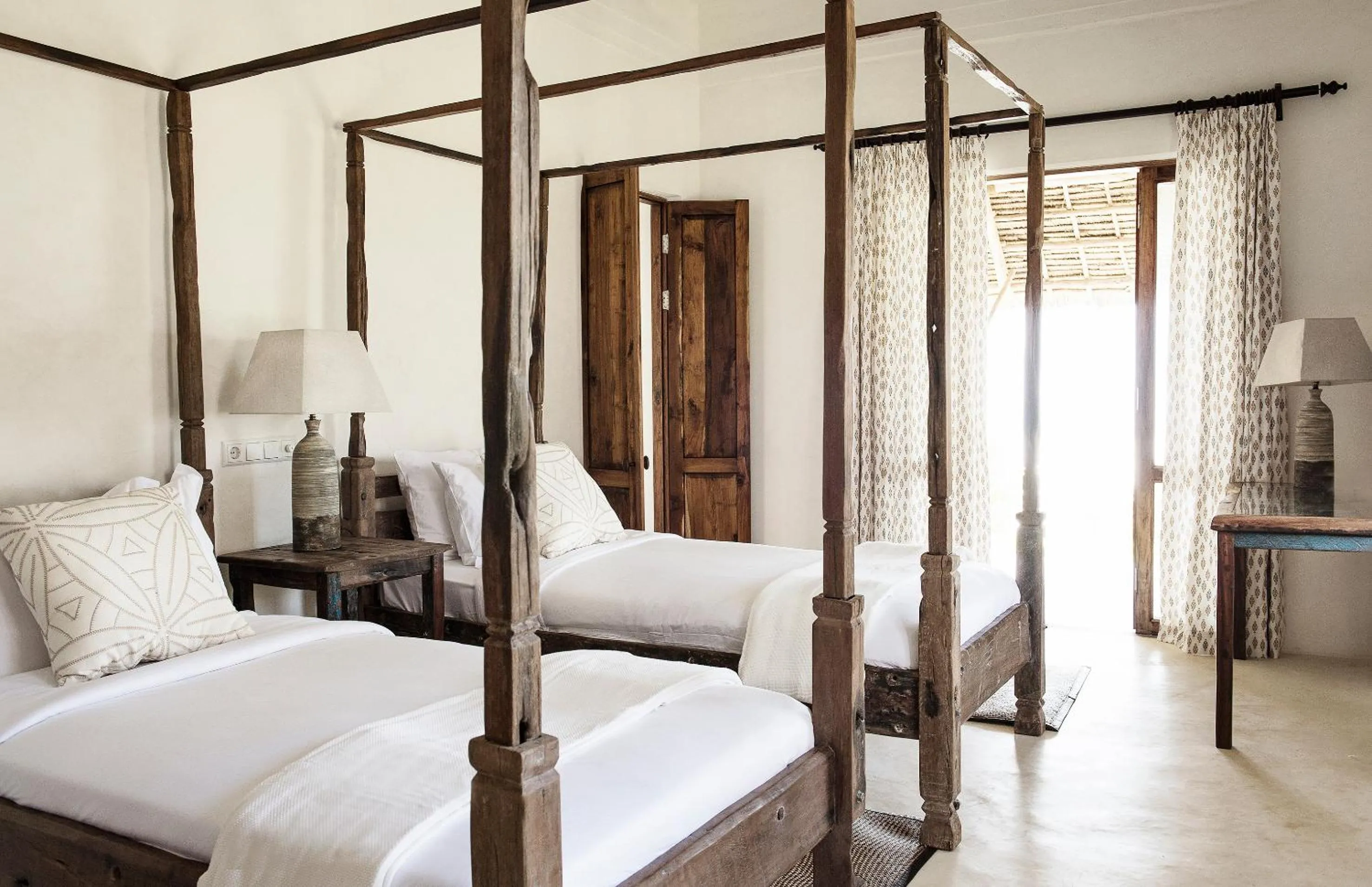 Bed in Qambani Luxury Resort