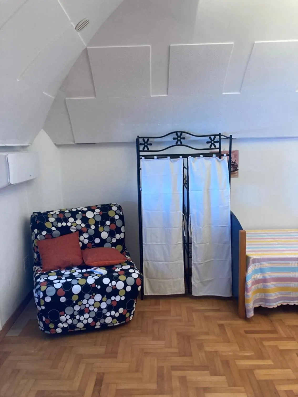 Bed in Tolomei House Holidays Sea View