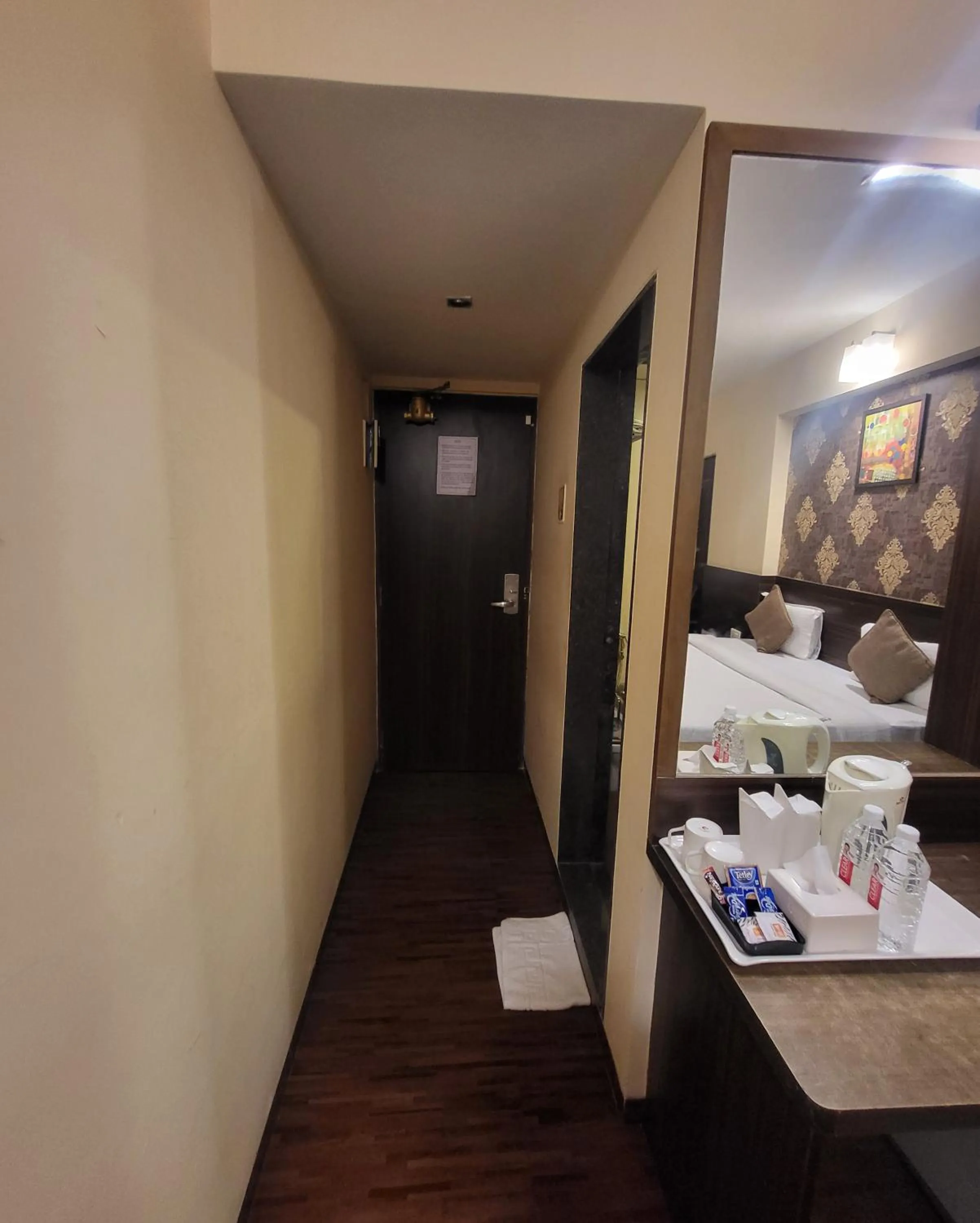 Bedroom in Hotel Maharana Inn Chembur