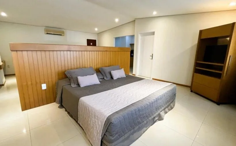 Bed in Le Village Flats e Hotel