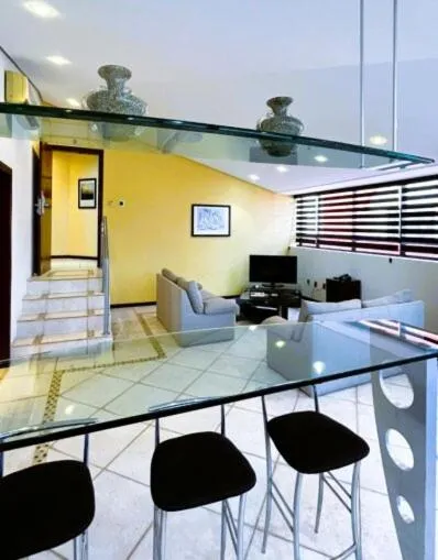 Le Village Flats e Hotel