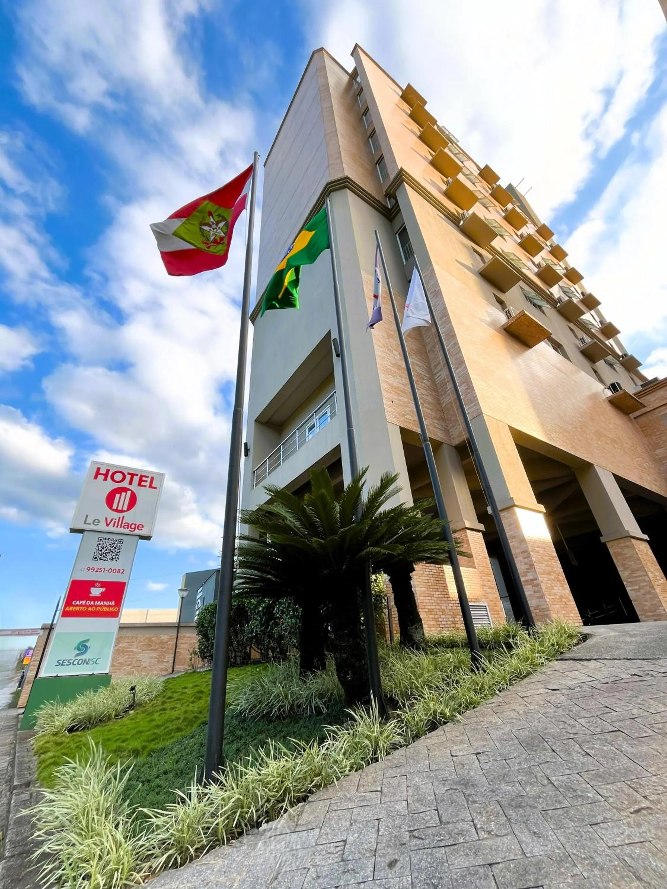 Le Village Flats e Hotel