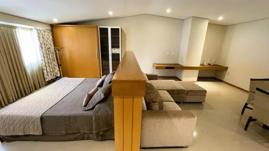 Bed in Le Village Flats e Hotel