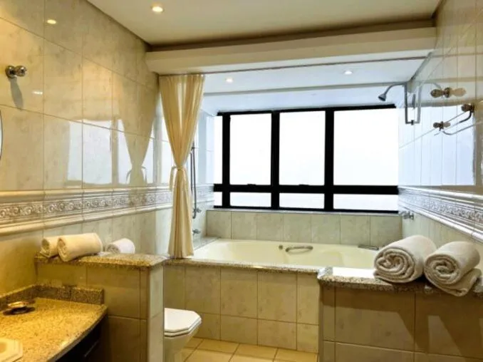 Le Village Flats e Hotel