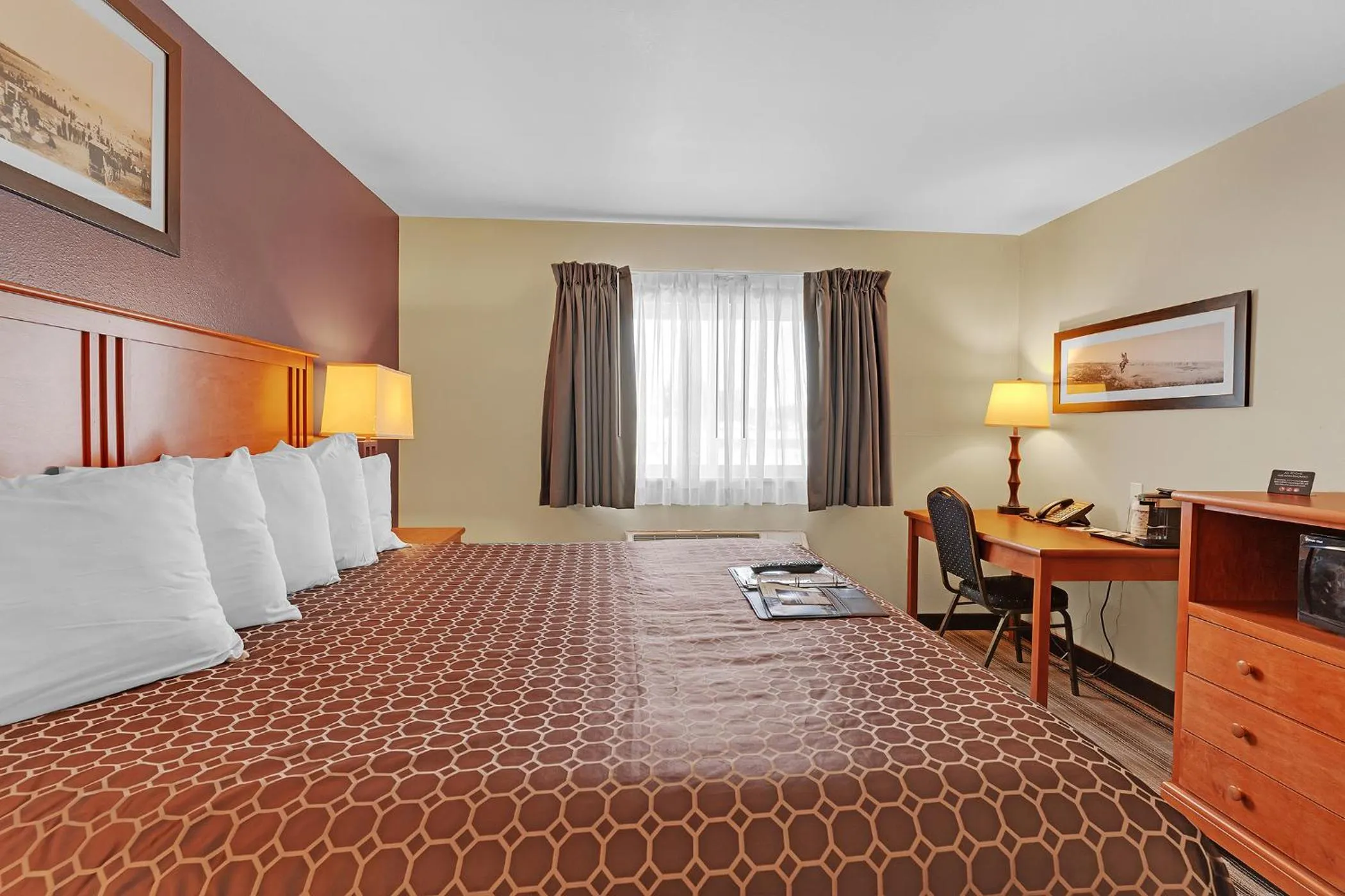 Bed in Bowman Lodge & Convention Center