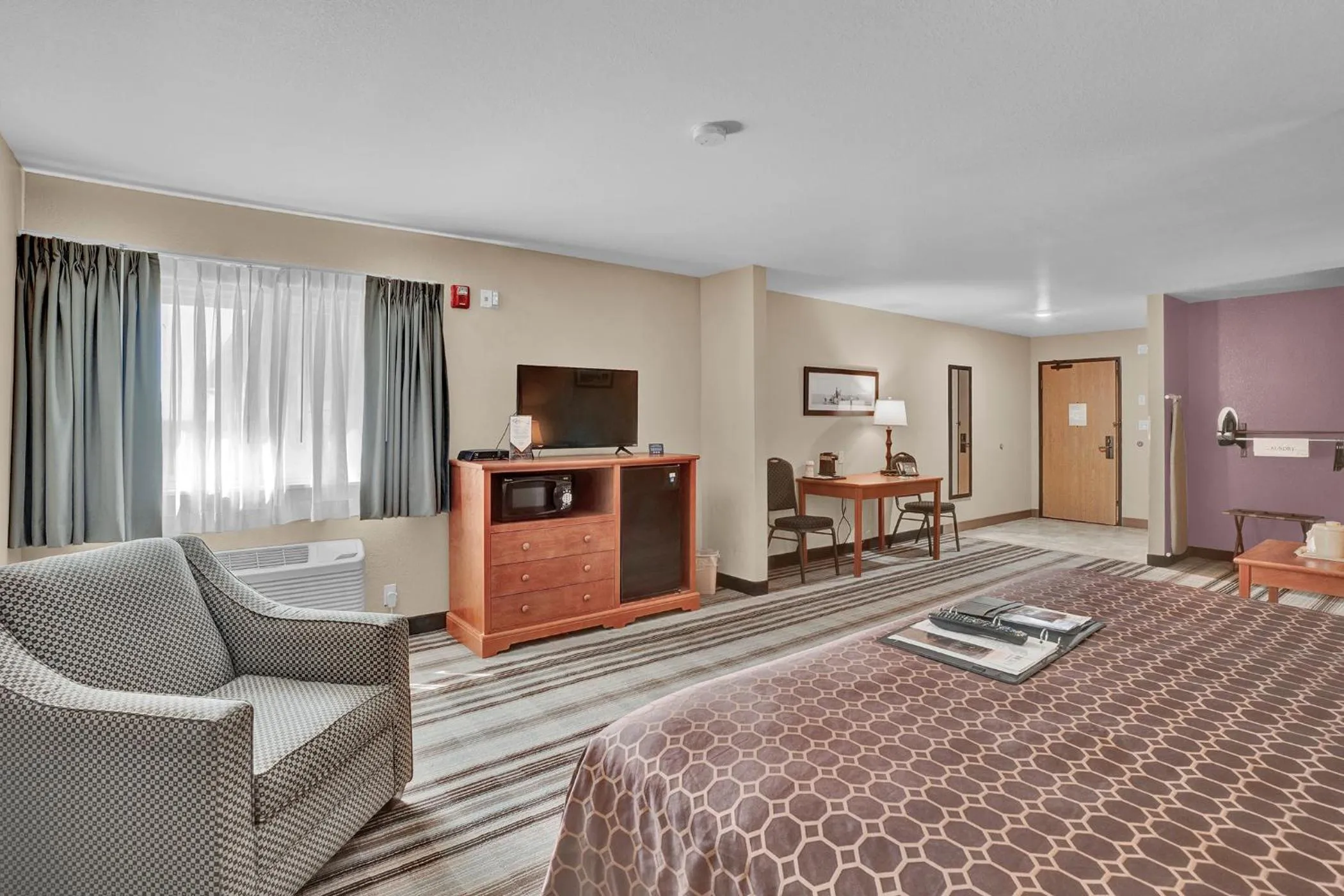 Bed in Bowman Lodge & Convention Center