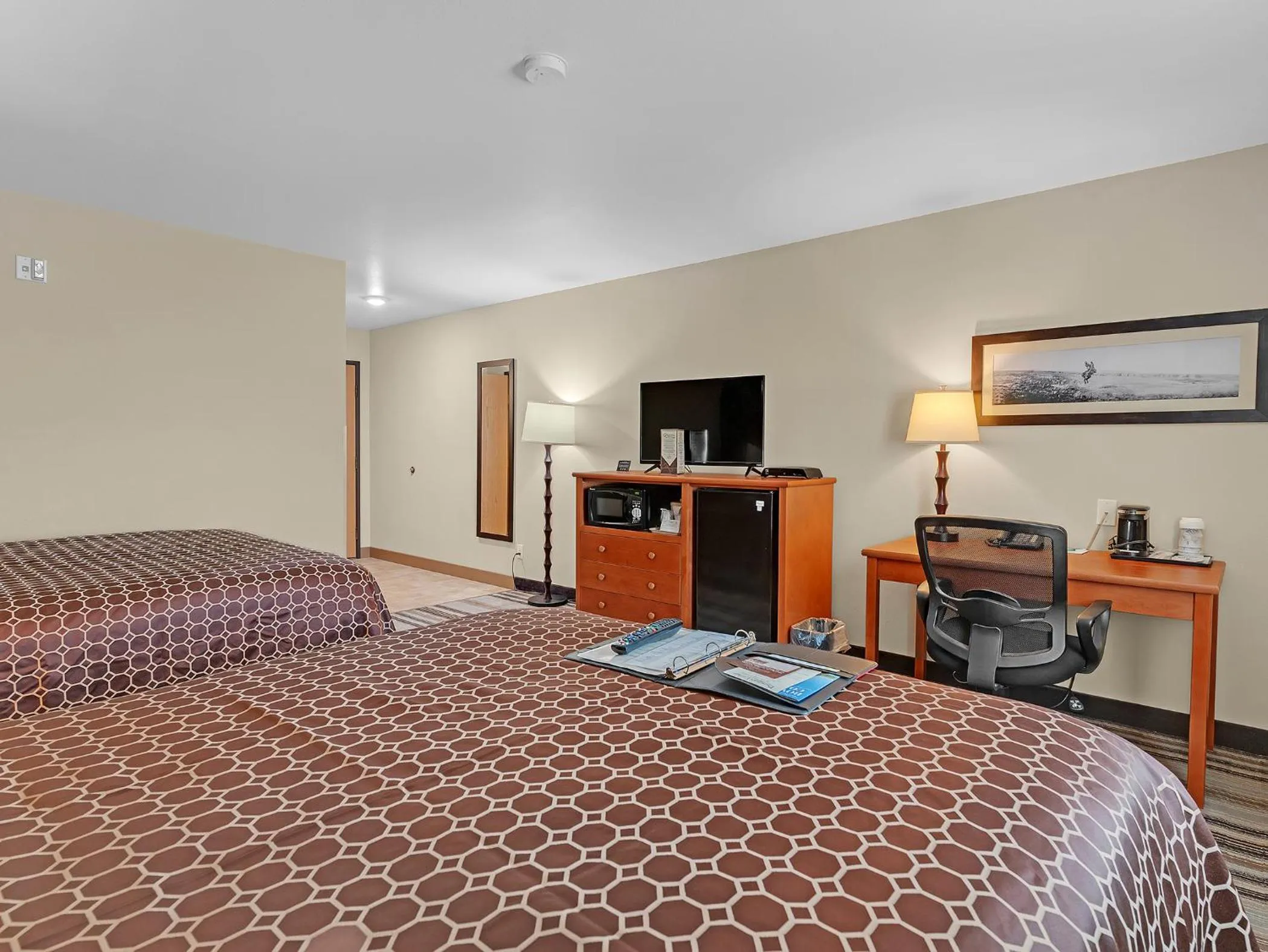 Bed in Bowman Lodge & Convention Center