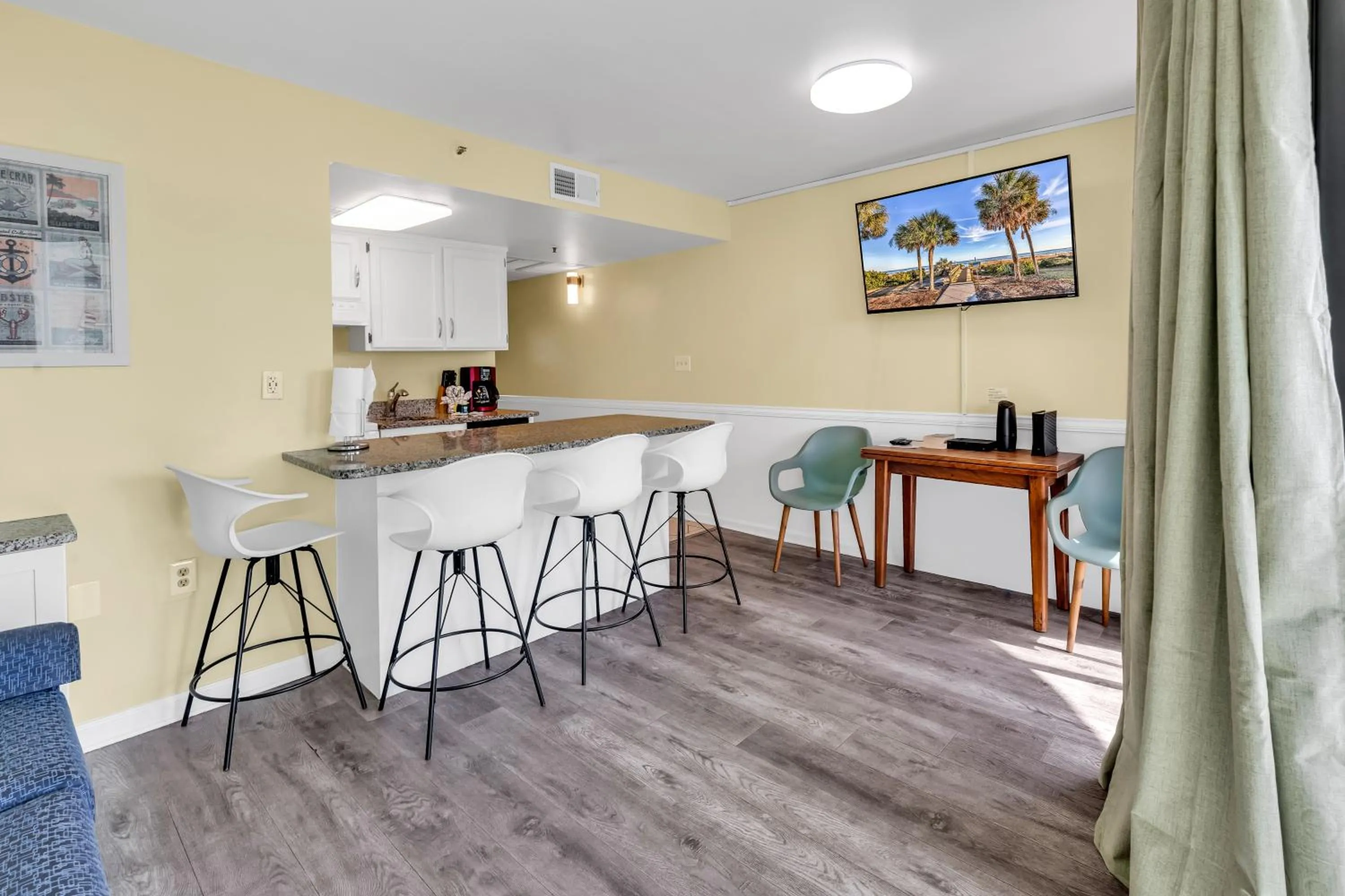 Kitchen or kitchenette in Oceanfront condo Steps to the beach w No Resort Fees