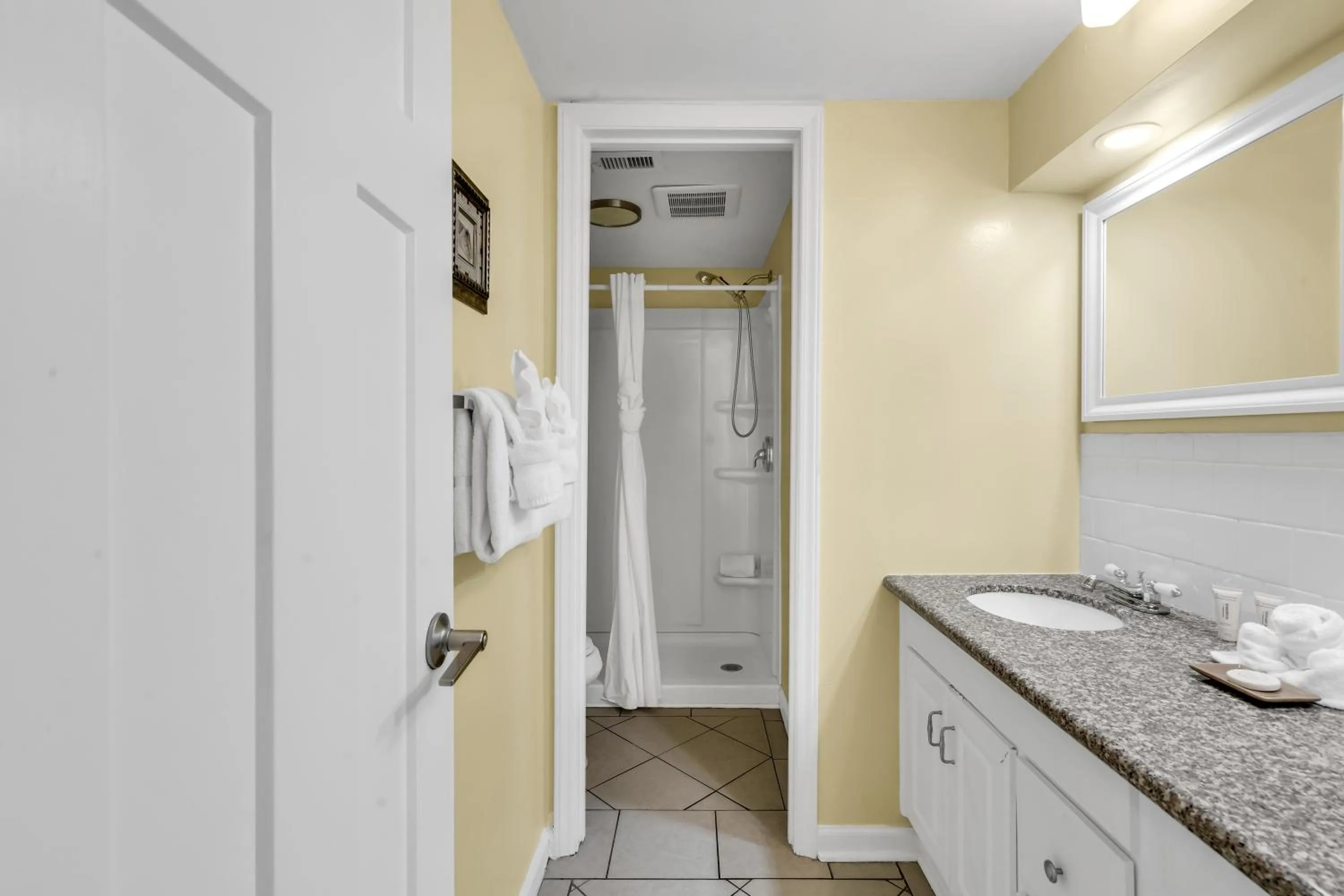 Bathroom in Oceanfront condo Steps to the beach w No Resort Fees